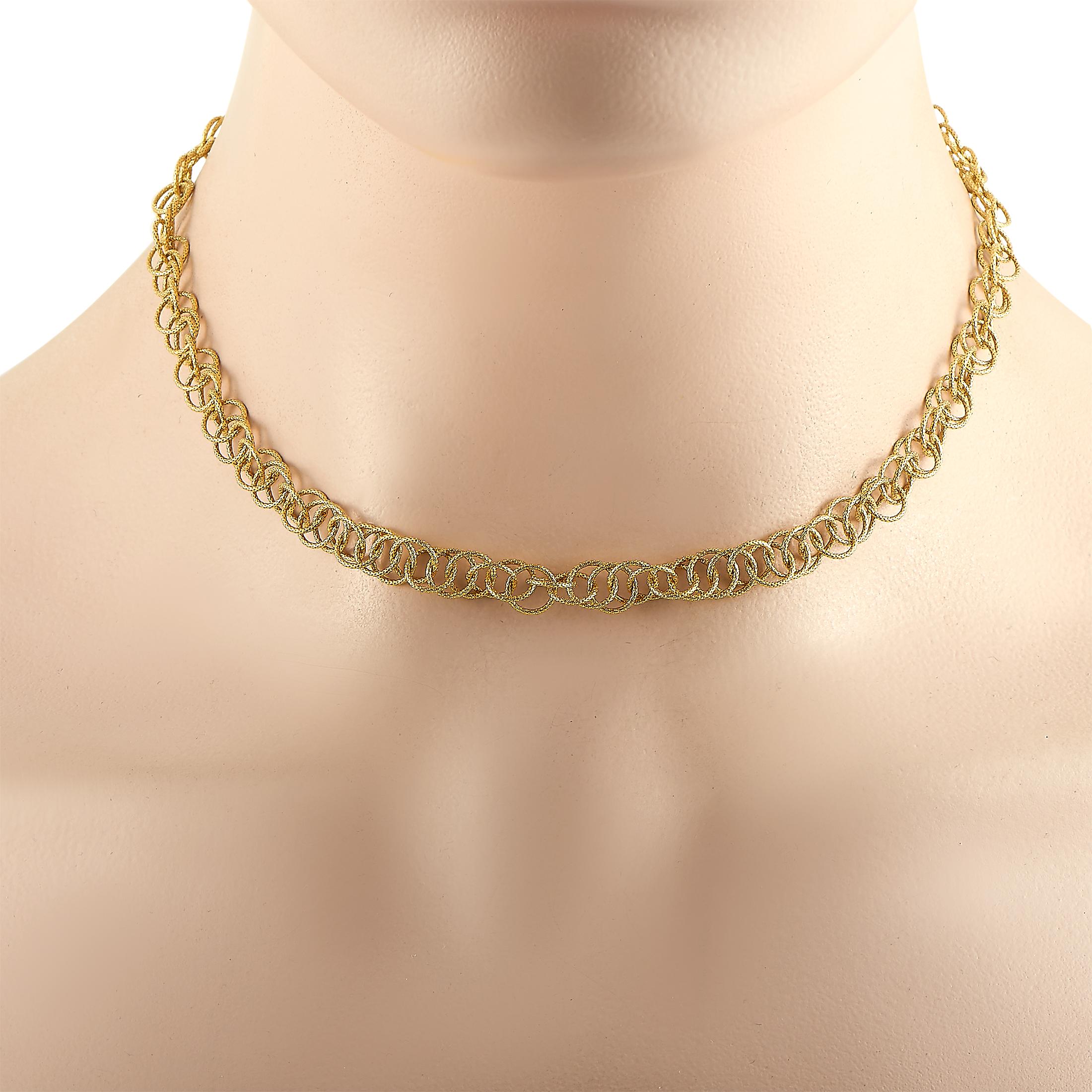 The Buccellati “Honolulu” necklace is crafted from 18K yellow gold and weighs 22.8 grams, measuring 15” in length.

This jewelry piece is offered in estate condition and includes a gift pouch.