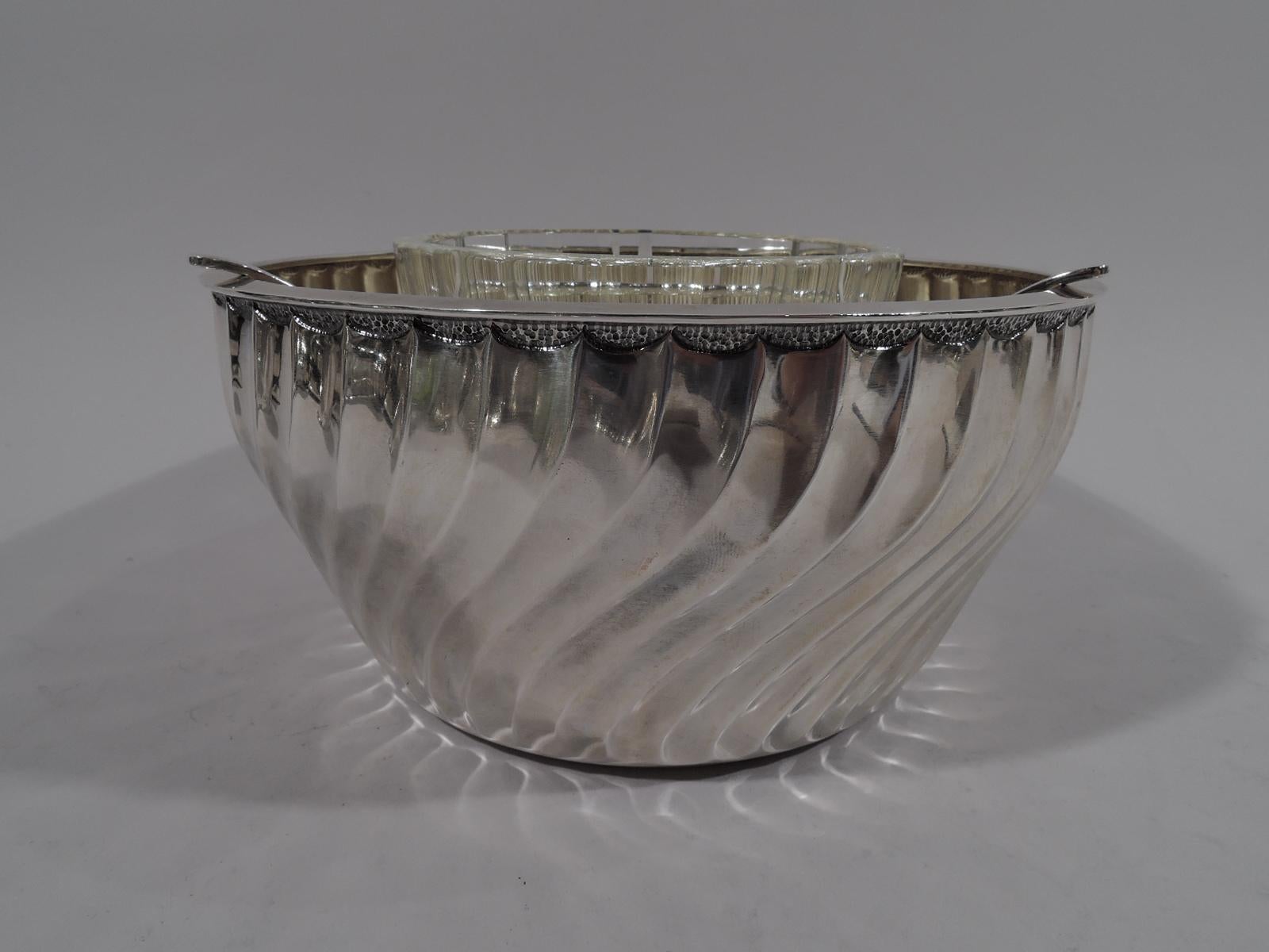 Italian Classical sterling caviar bowl. Curved and tapering sides with swishing, twisting flutes and discreet stippled lunettes near flat rim. Detachable tripod open frame with fluted clear glass bowl. A beautiful addition to the buffet. Fully