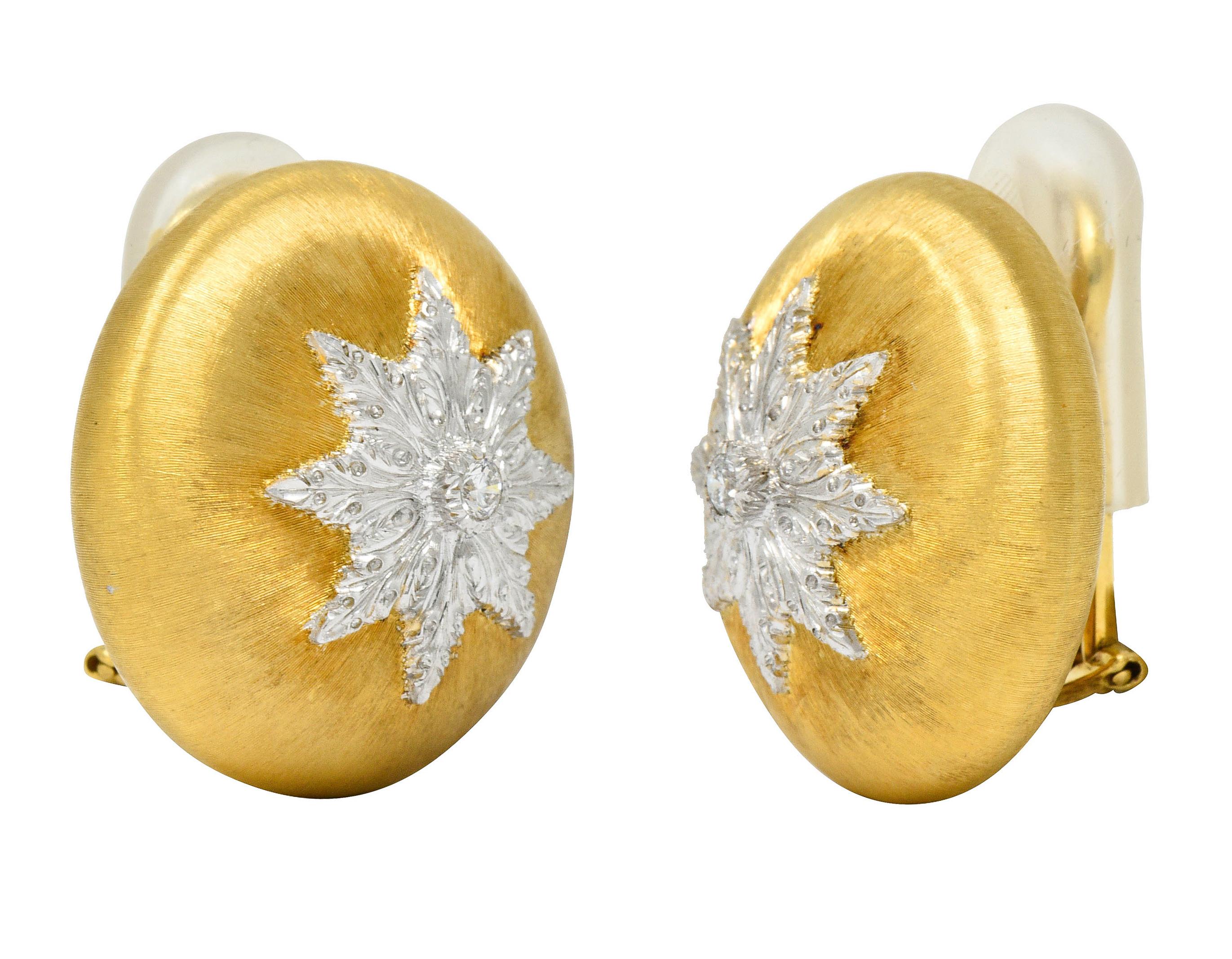Ear-clip earrings are designed as planished gold domes with a strongly brushed finish

Featuring a white gold snowflake motif with deeply engraved details

Centering round brilliant cut diamonds weighing in total approximately 0.16 carat; eye-clean