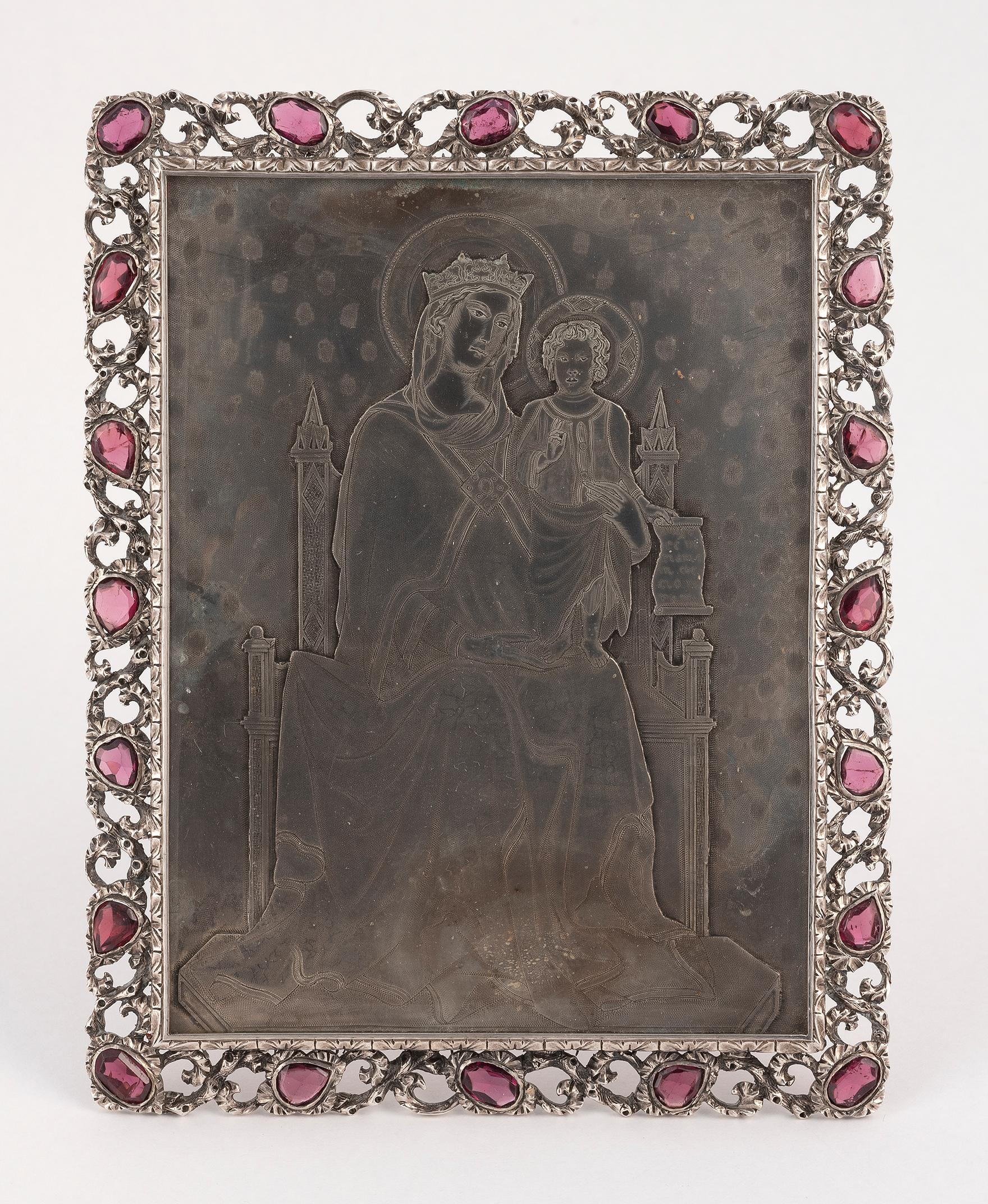 The frame oblong and with an openwork ruby-set border, containing a glazed engraved icon depicting the virgin and child.
Signed 'M. Buccellati Milano Firenze, with original leather box
Measures: High 10cm.