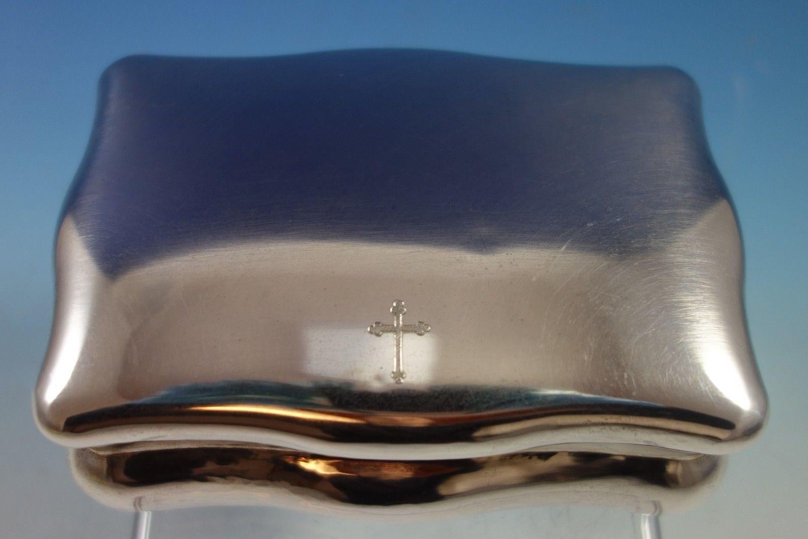 Buccellati fine Buccellati sterling silver jewelry box. The box has an etched cross on the top. It also has an inscription carved on the lip, inside edge of the cover that says, Christine Grace Marie June 19, 1990. The box measures 2 5/8 x 4 1/4 x