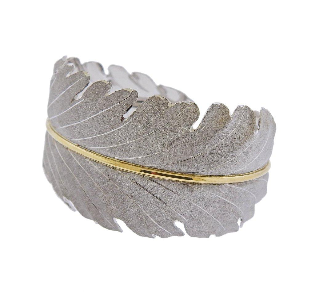18k yellow gold and sterling silver leaf cuff bracelet by Buccellati. Retail $14800. Bracelete will fit approx. 7