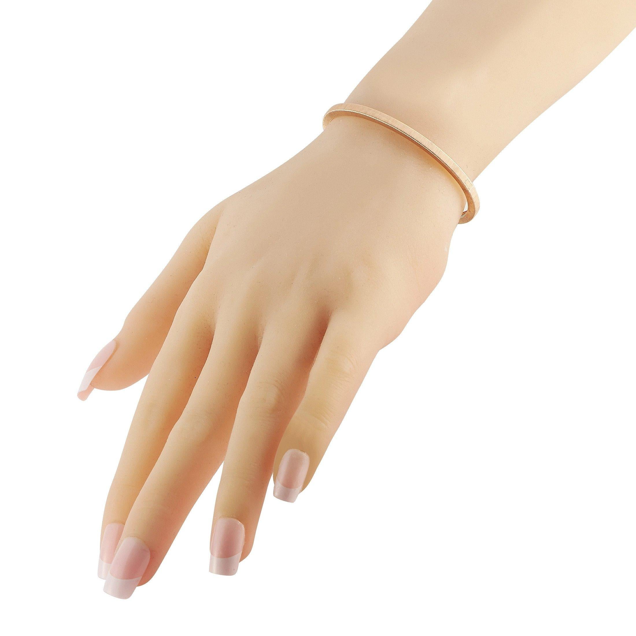 Sleek and simple, this Buccellati bangle, from the Macri collection, is an impeccable piece that is perfect for wear alone or stacked together with other luxury bracelets. Made from 18K Rose Gold, this timeless piece measures 7” long and features a