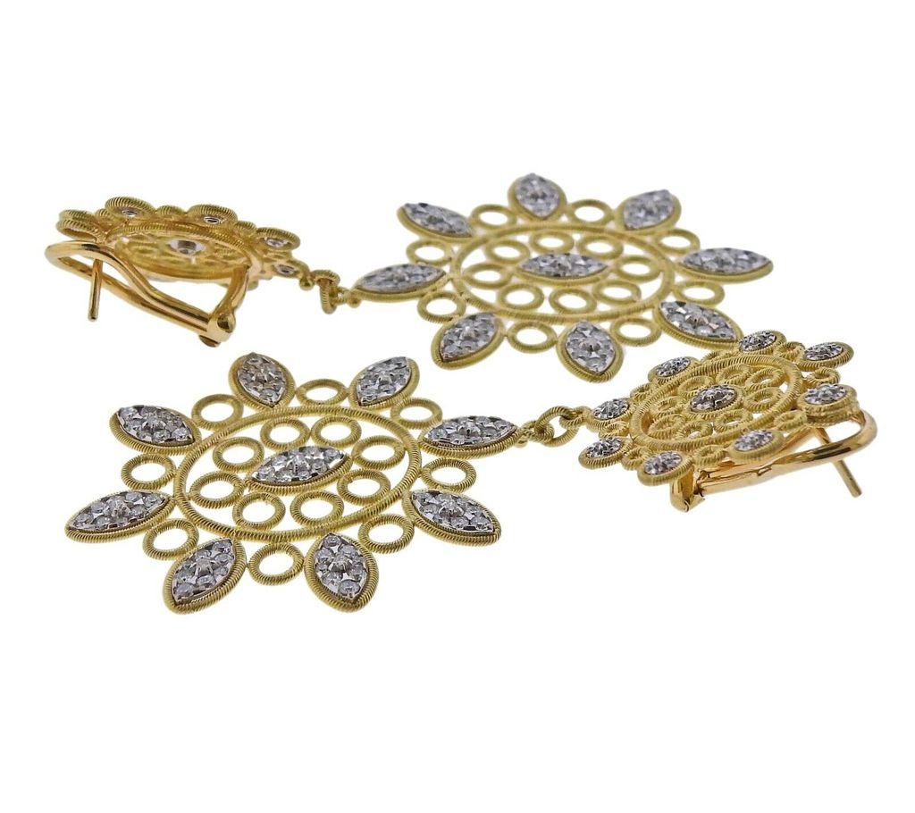 Pair of 18k gold openwork Carlotta drop earrings by Buccellati, with approx. 2.90ctw in H/VS-Si diamonds. Earrings measure 67mm x 35mm. Marked - Buccellati, Italy, 18k. Weight - 22.8 grams. Current Retail Price $19900