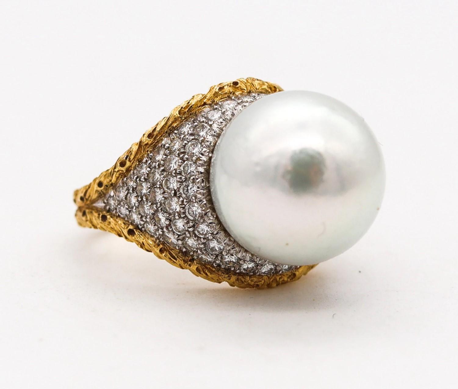 ﻿Pearl Cocktail Ring Designed by Buccellati.

Magnificent rare piece, created in Milano Italy by the luxury house of Buccellati. This gorgeous cocktail ring has been carefully crafted with baroque patterns in solid yellow gold of 18 karats and white