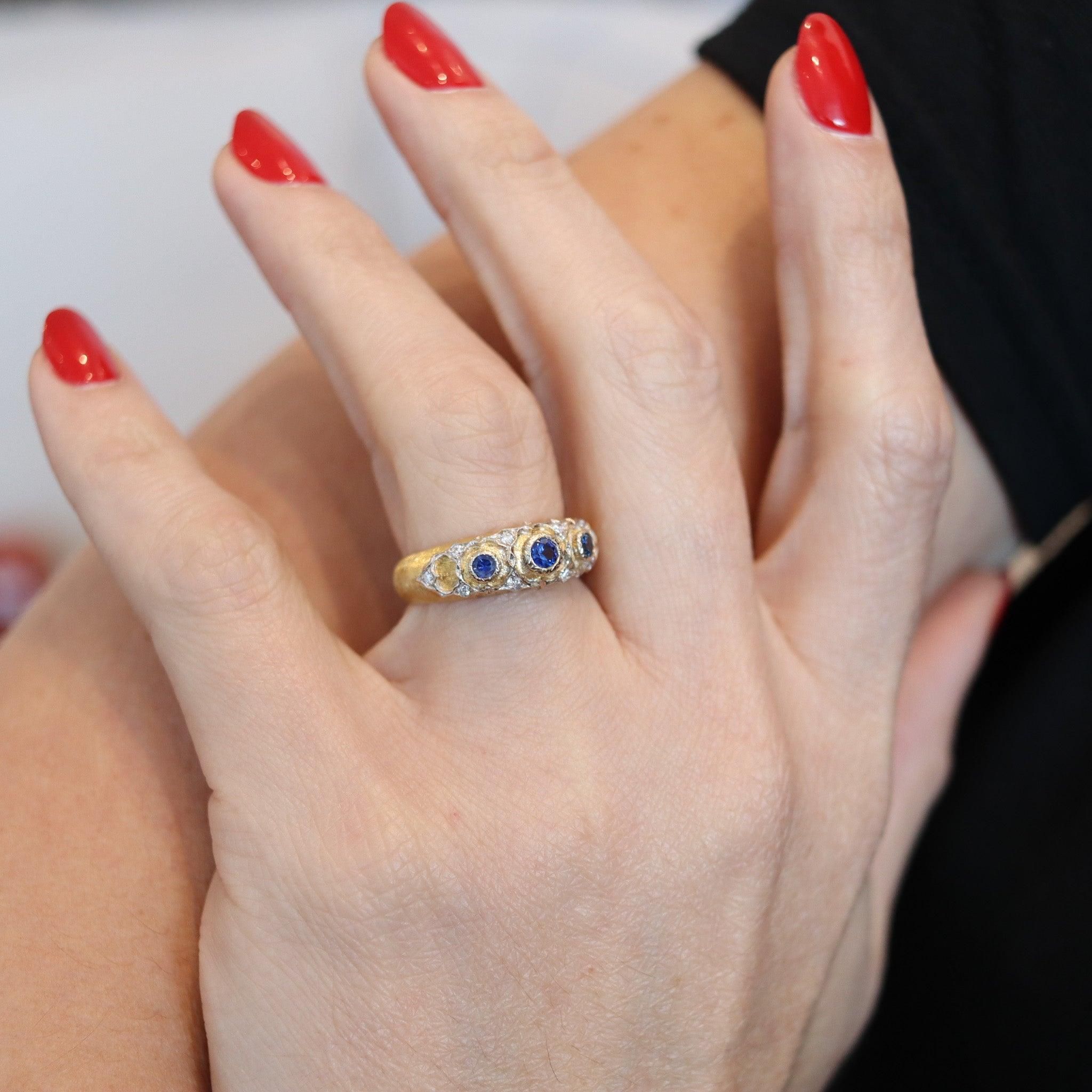 Gem set ring designed by Mario Buccellati.

This is a stunning band ring, created in Milano Italy by the famous jewelry house of Buccellati, back in the 1970. This ring was masterfully crafted in the Baroque renaissance styles in solid yellow gold
