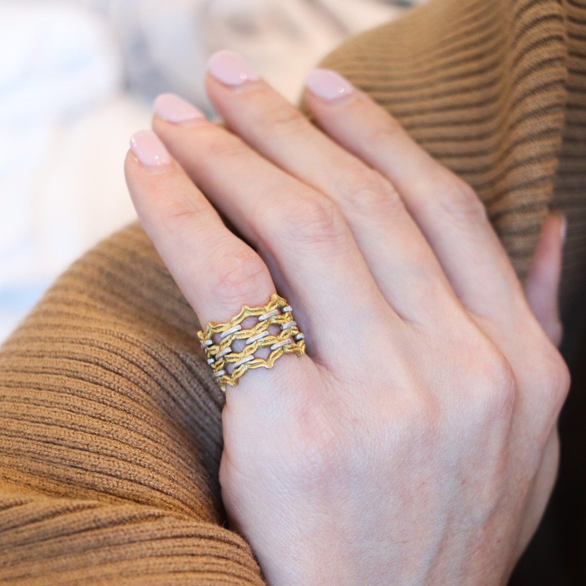 Woven wide ring designed by Mario Buccellati.

This is a beautiful wide band ring created in Milano Italy by the famous jewelry house of Buccellati, back in the 1990. This ring was masterfully crafted in the Baroque renaissance styles in two tones