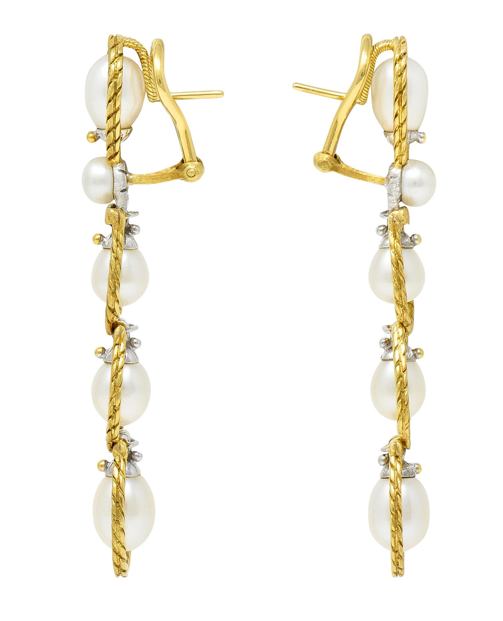 Long drop earrings feature round and drop pearls - some articulated

Well matched in white body color with very good luster

Measuring from 5.0 mm to 6.5 x 8.0 mm - seated in white gold pearl cups

Each surrounded by twisted rope frames - matte
