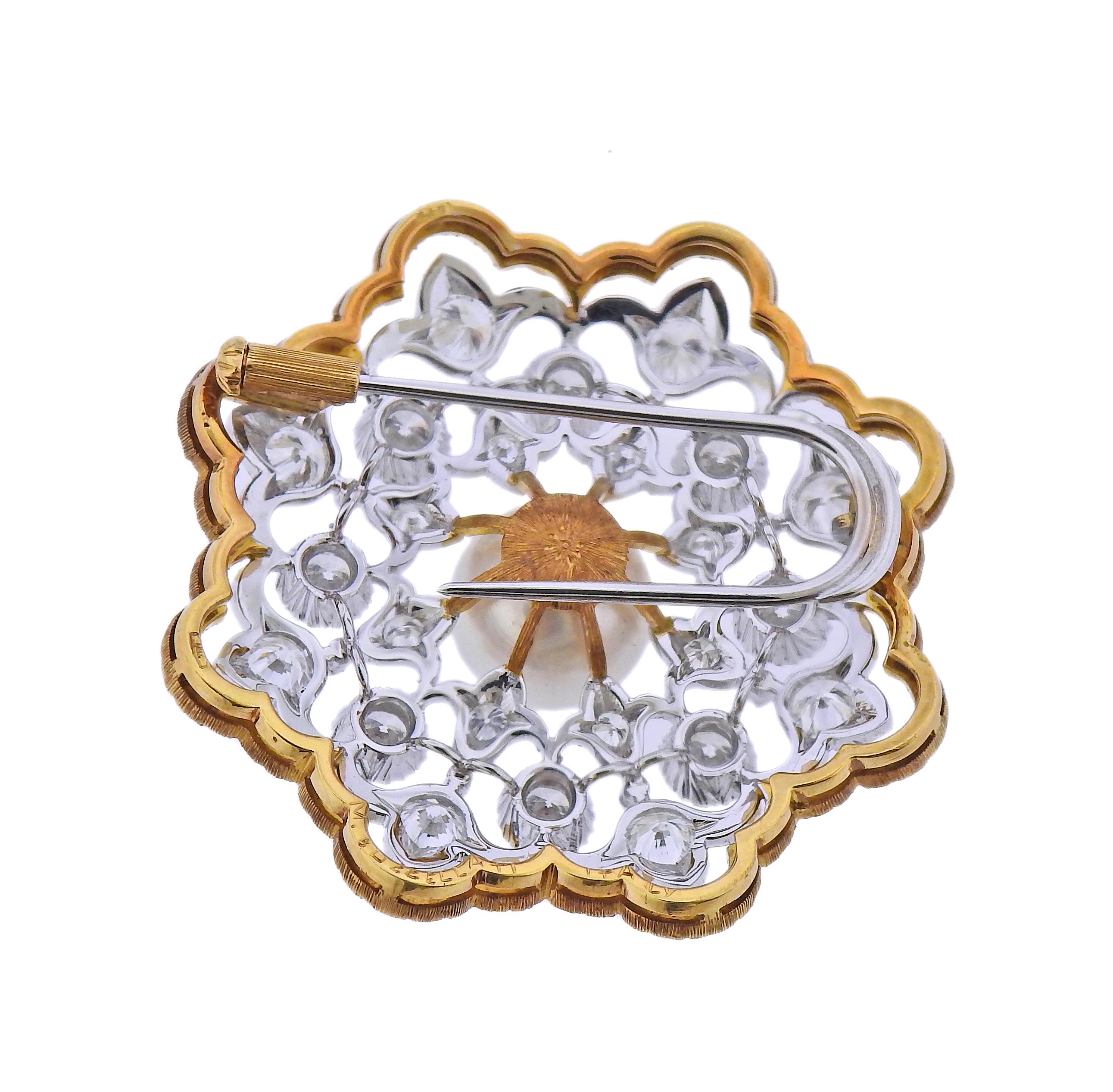 18k white and yellow gold brooch by Buccellati, with 10.3mm pearl and approx. 3.00ctw in H/VS-SI1 diamonds.  Brooch is 40mm x 40mm. Weight 17 grams. Marked: Buccellati, Italy, 18k. 