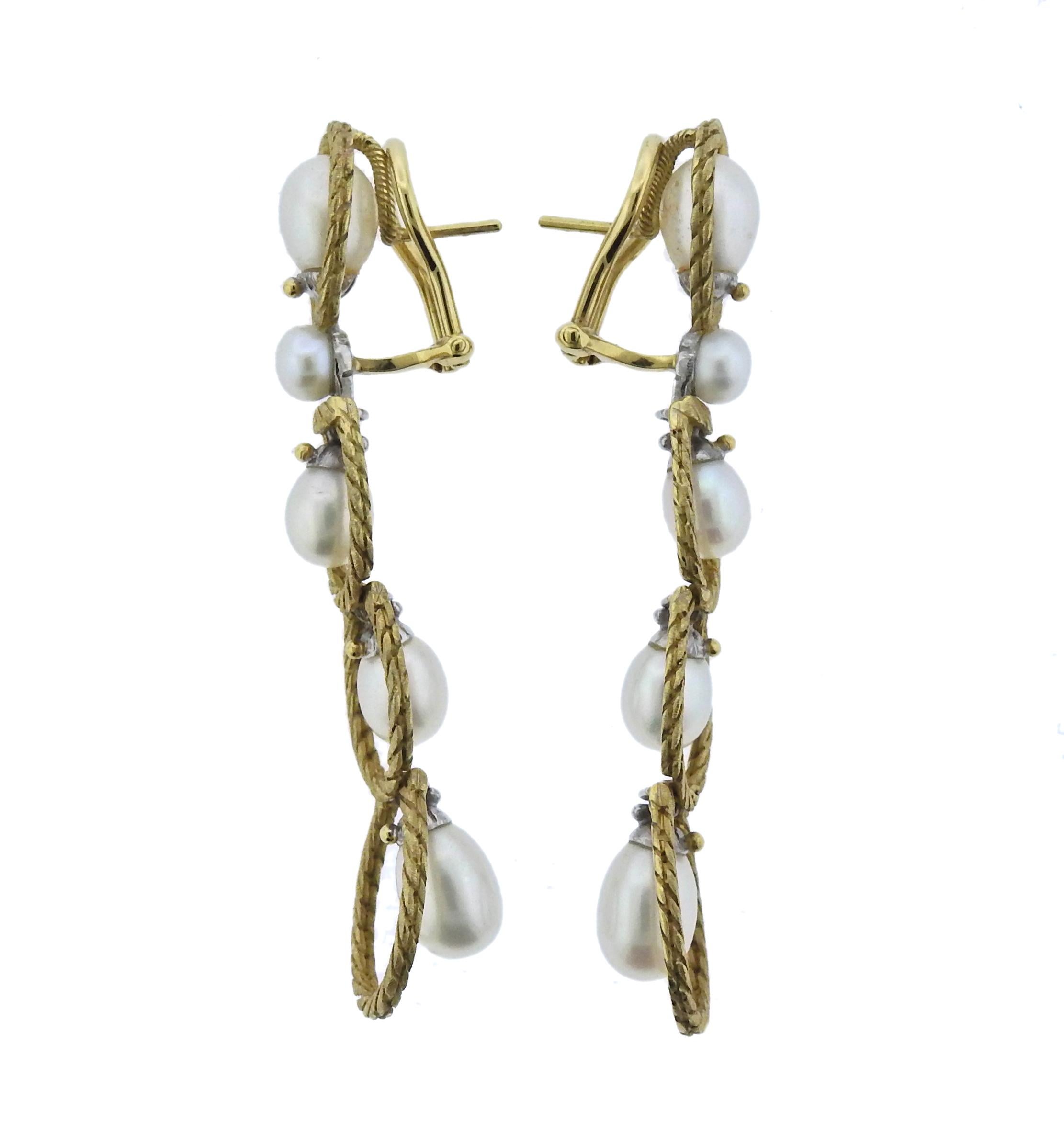 Pair of long drop earrings by Buccellati, set with pearls.  Earrings are 59mm x 14mm, weigh 16.8 grams. Marked: 750 18k Buccellati .