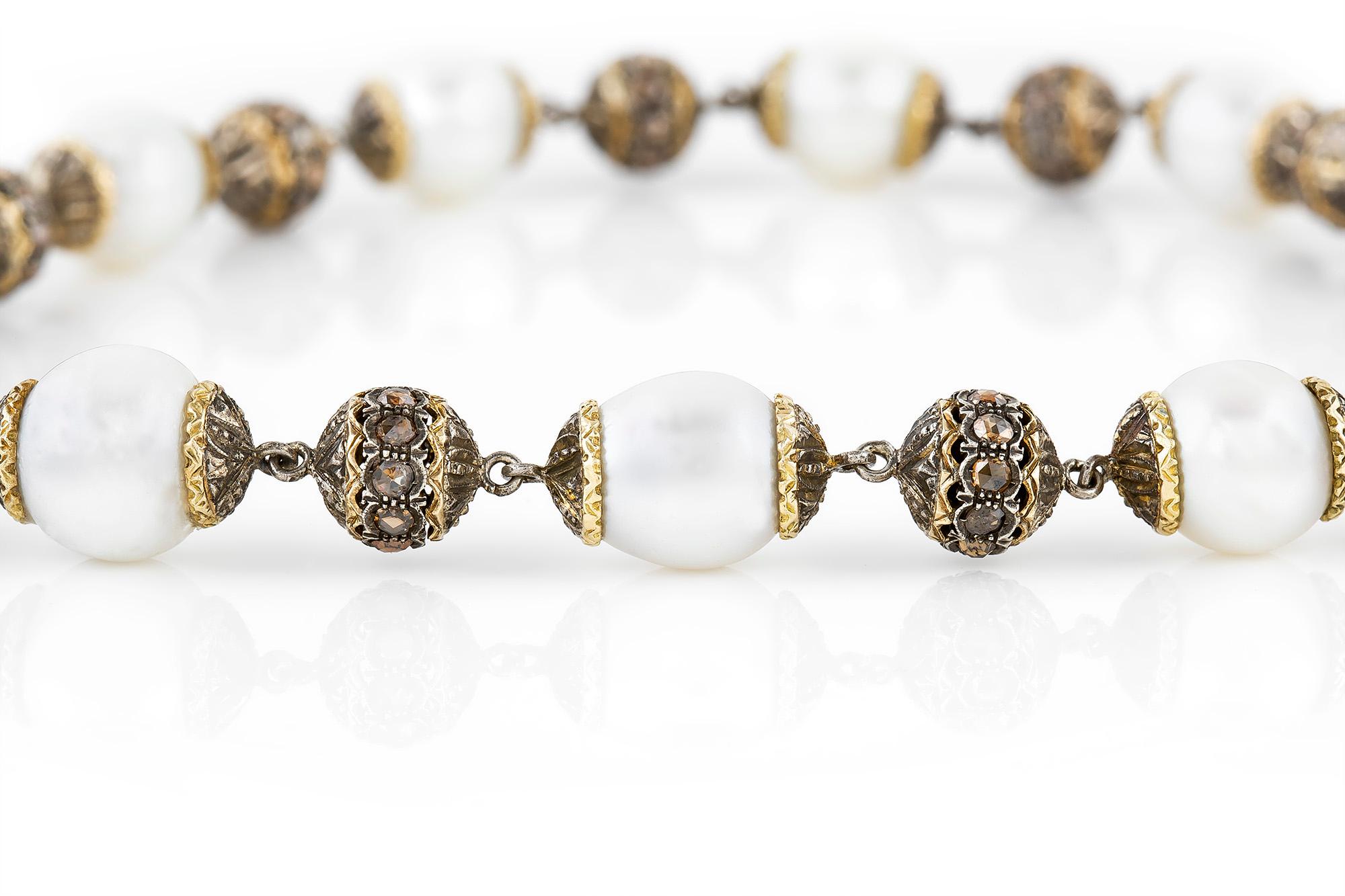 Signed by Buccellati pearl necklace, finely crafted in 18k yellow gold with champagne rose cut diamonds. Circa 1950's.