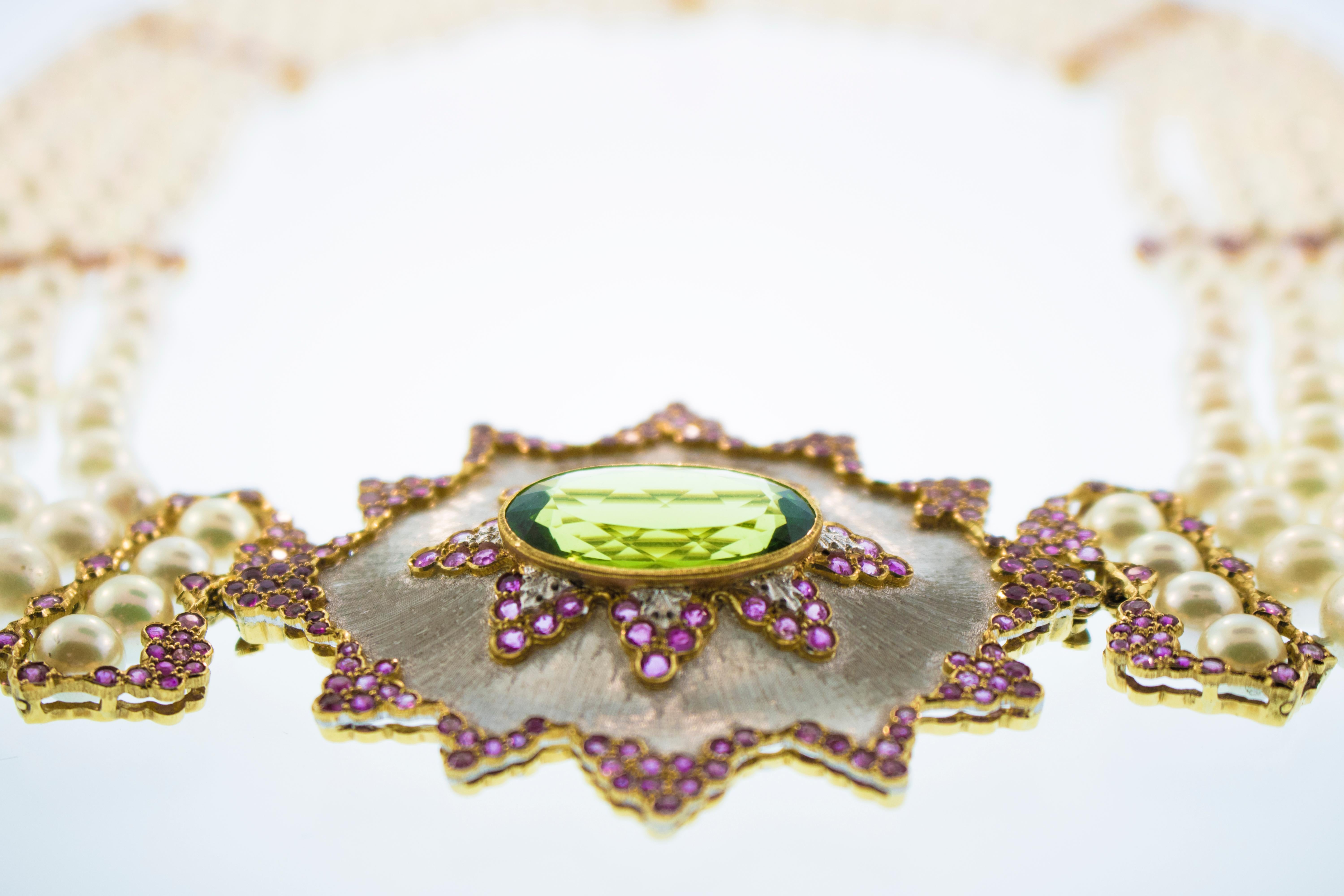 Buccellati pearl, pink sapphire and peridot necklace, with detachable brooch. Total weight is 169.68 grams. weight of the Peridot approximately 15 carat, pink sapphires approximately 5 carats, and 18k gold detachable middle brooch mounted in