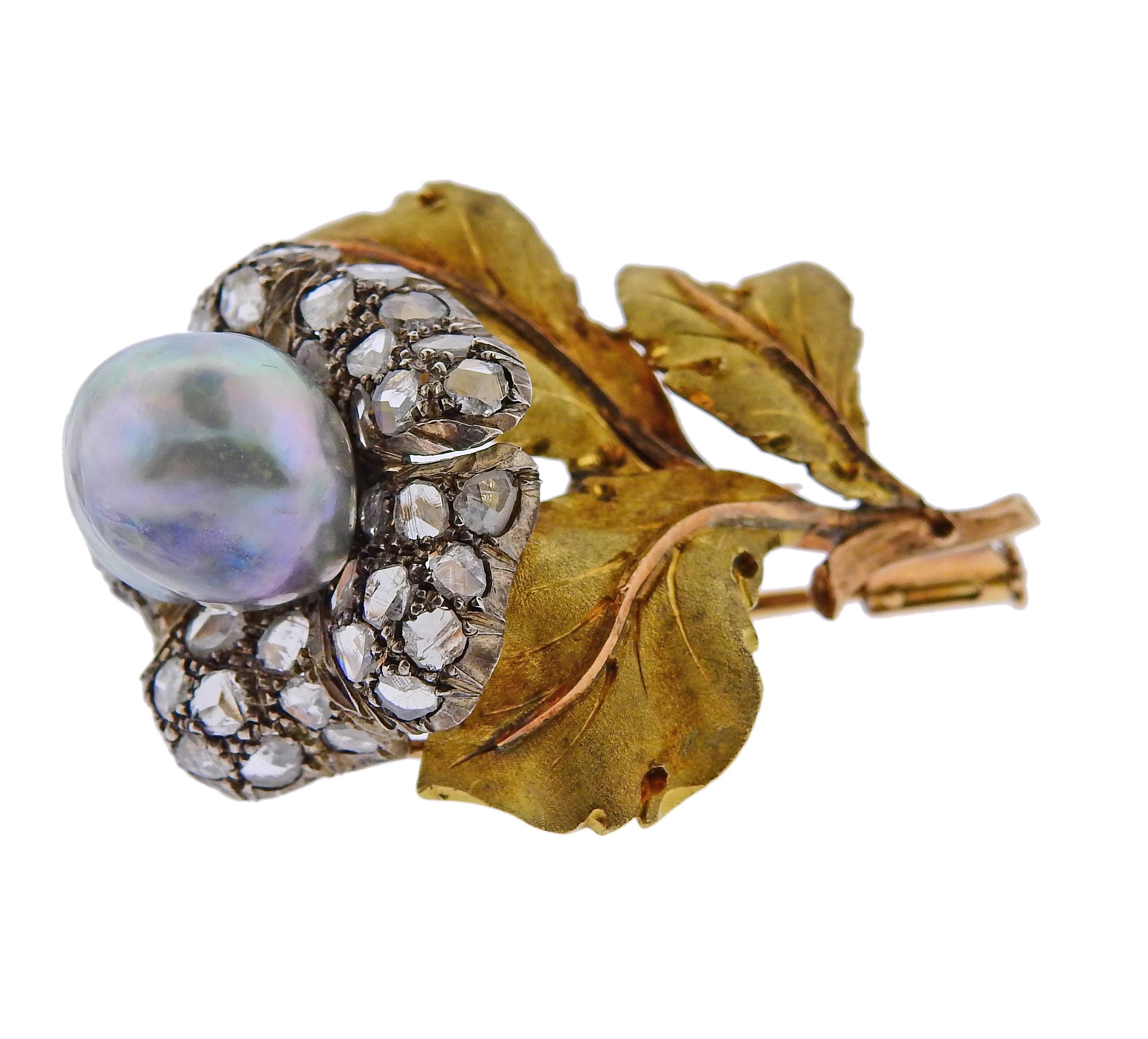 18k gold and silver brooch by Buccellati, set with rose cut diamonds and an approx. 12.5mm x 10.8mm pearl.  Brooch is 44mm x 32mm and weighs 13 grams. Marked Buccellati.