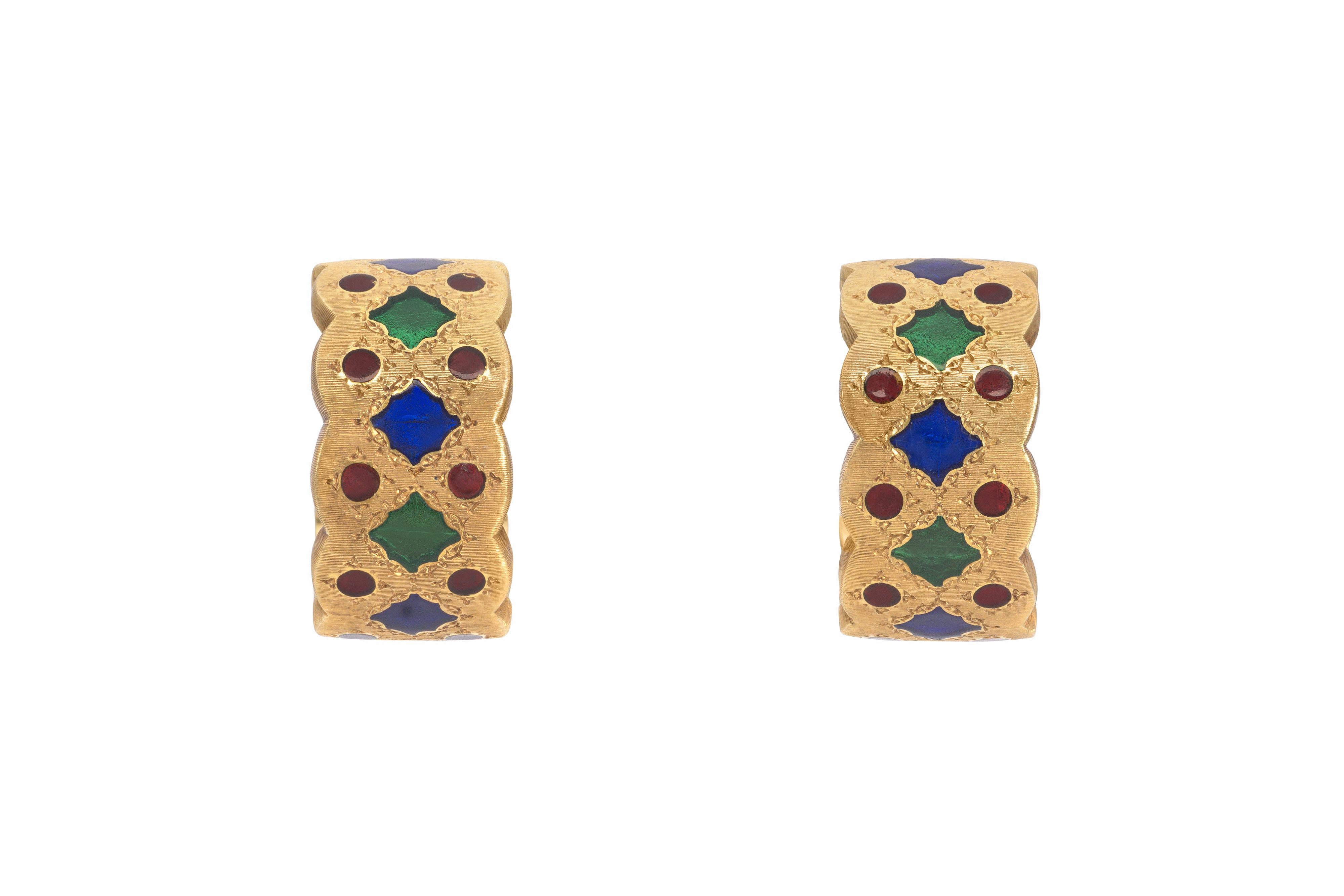 A pair of very attractive and wearable plique-a-jour enamel earrings, by Buccellati. The earrings are signed Buccellati Italy, K18 and numbered. Post and clip closure for pierced ears. 