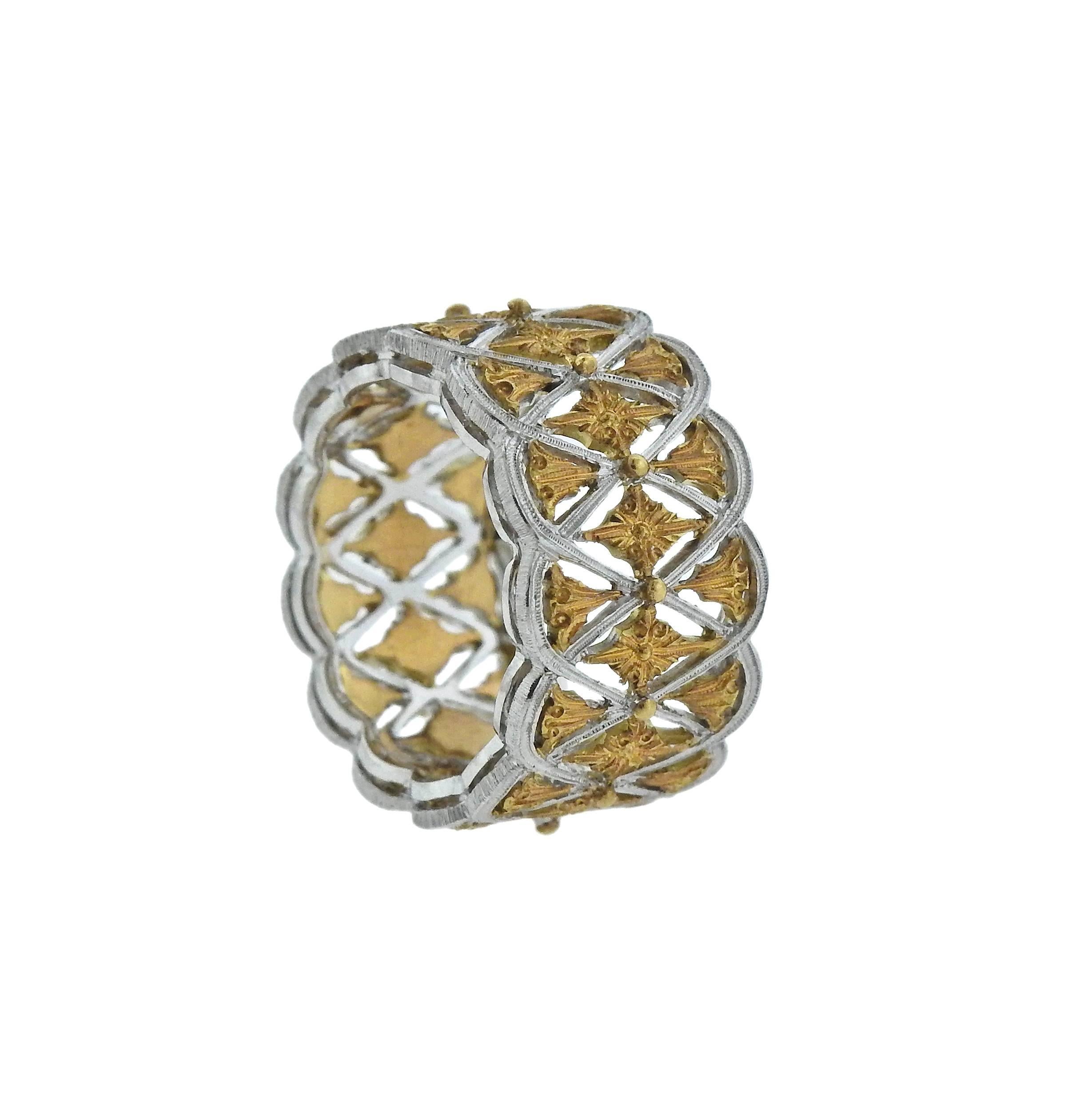 18k yellow and white gold band ring, crafted by Buccellati. Retail $ 8400. Ring size - 5, ring top is 11.2mm wide  , weighs 7.4 grams. Marked: Italy, 18k, Buccellati , BL 750.