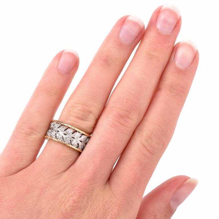 This enchanting eternity ring by Mario Buccellati is of Italian provenance, crafted in 18K Two-tone gold. This beautiful ring is from ‘Ramage’ collection, exposes botanical leaf profiles open work rendered in matted white gold with 18k yellow gold