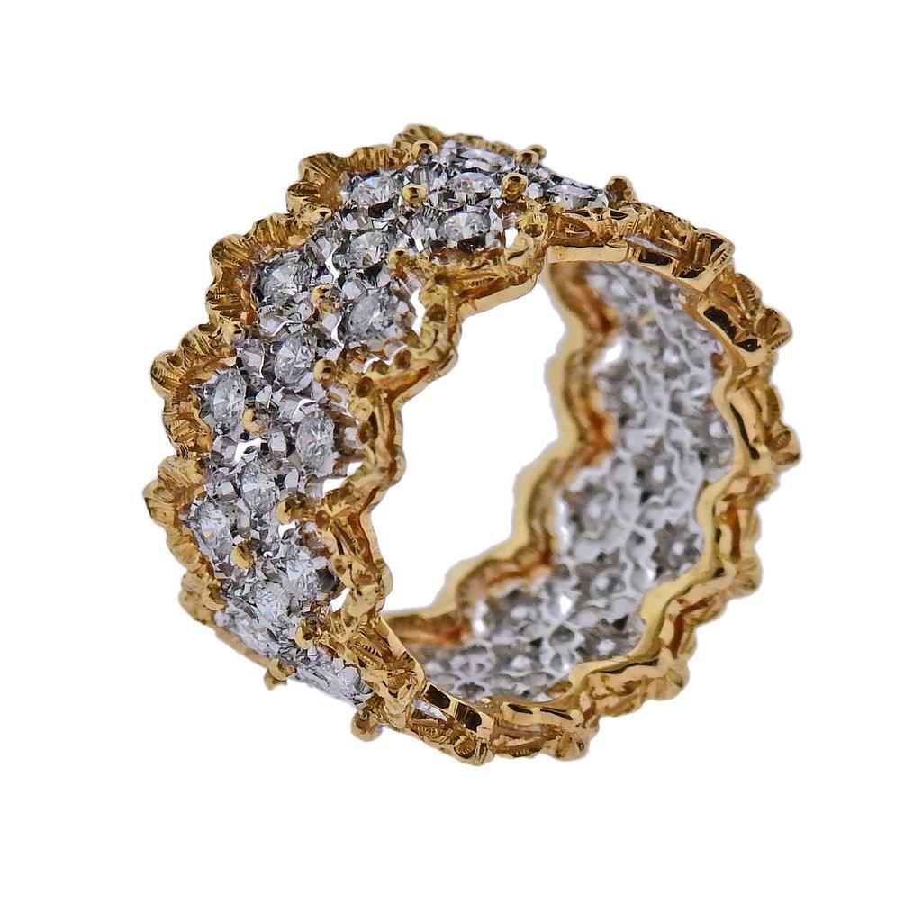 Iconic Rombi wide band ring by Buccellati, crafted in 18k yellow and white gold, adorned with approx. 1.17ctw in H/VS-SI diamonds. Ring size - 5, ring top is 12mm. Weight is 6 grams.