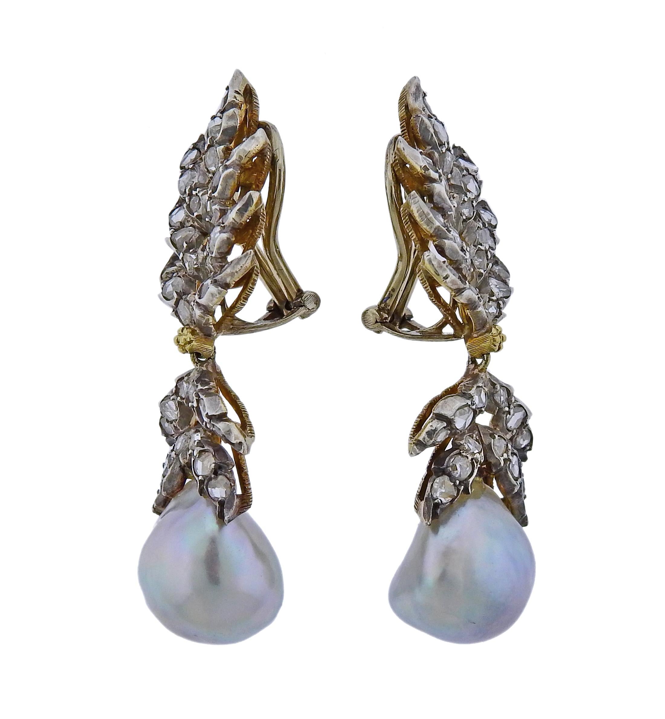 Pair of 18k yellow gold and silver top earrings by Buccellati, featuring rose cut diamonds and 14mm x 12mm pearls. Earrings are 45mm x 13mm and weigh 12.7 grams. Marked Buccellati Italy, 18k.
