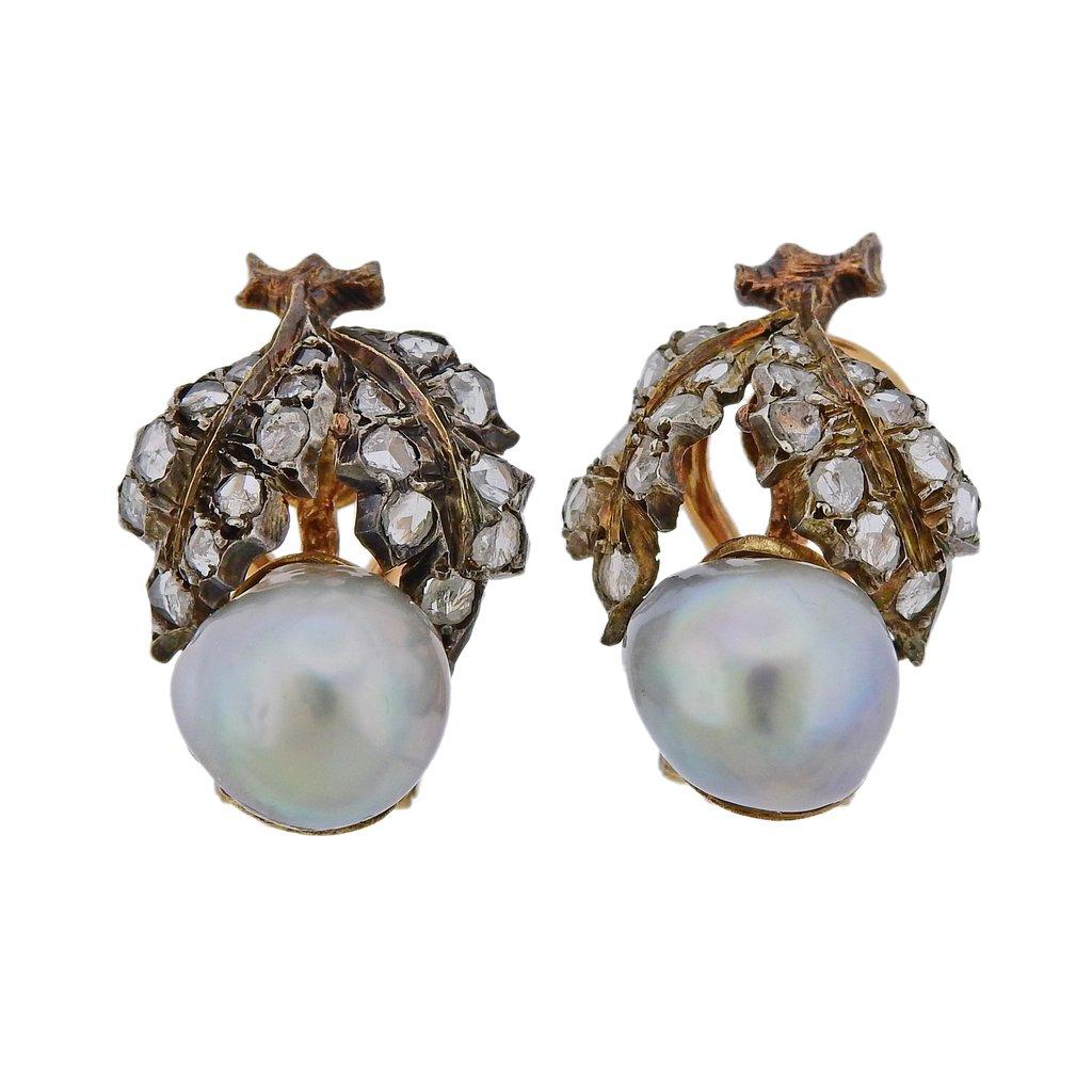 Pair of classic 18k gold and silver Buccellati earrings, set with 10.5mm x 11mm pearls and rose cut diamonds. Earrings are 25mm x 15mm. Weight is 12 grams, Marked Buccellati 750. 