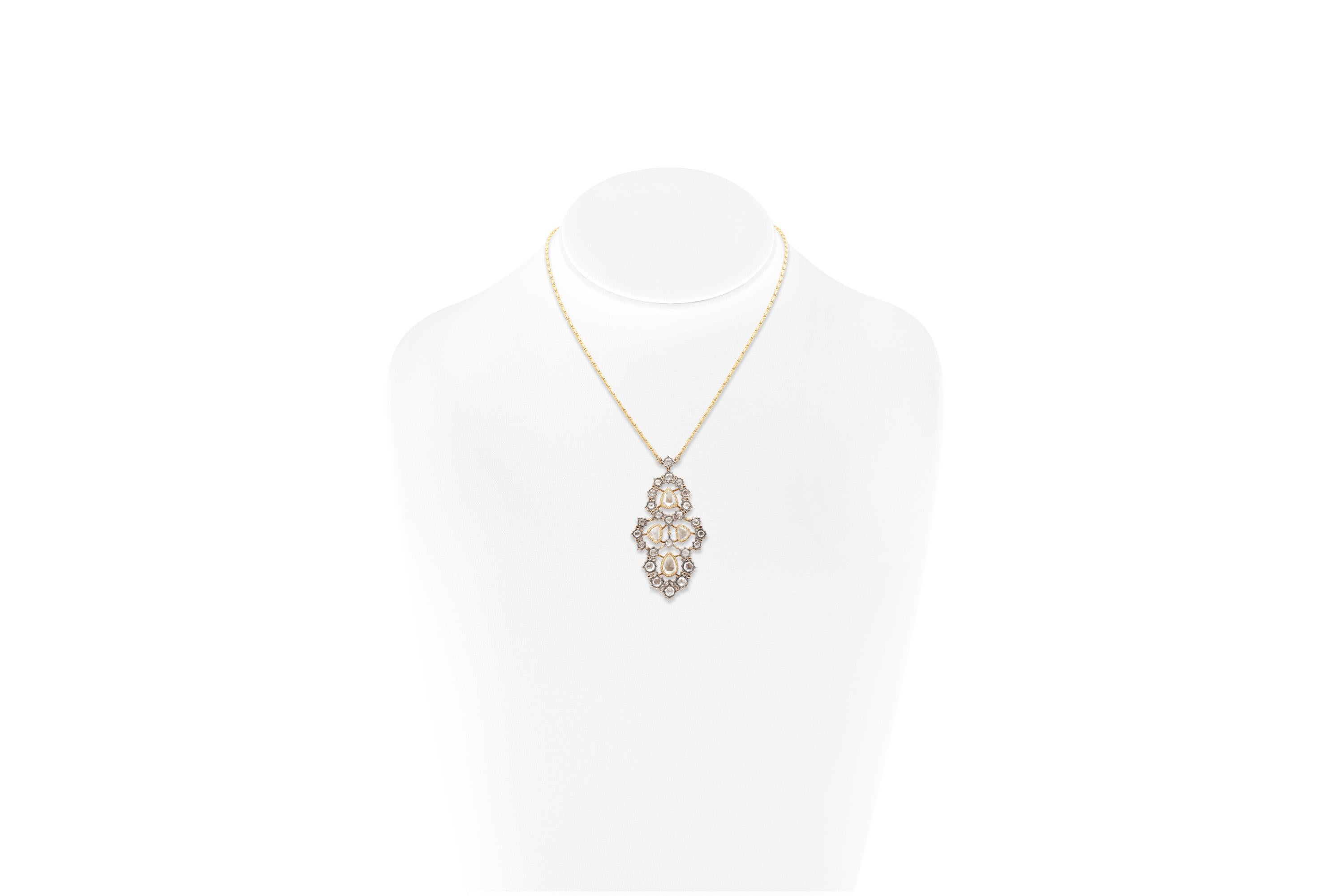 Finely crafted in 18k yellow gold and silver with Rose-cut diamonds.
Signed by Buccellati
The pendant measures 2 1/4