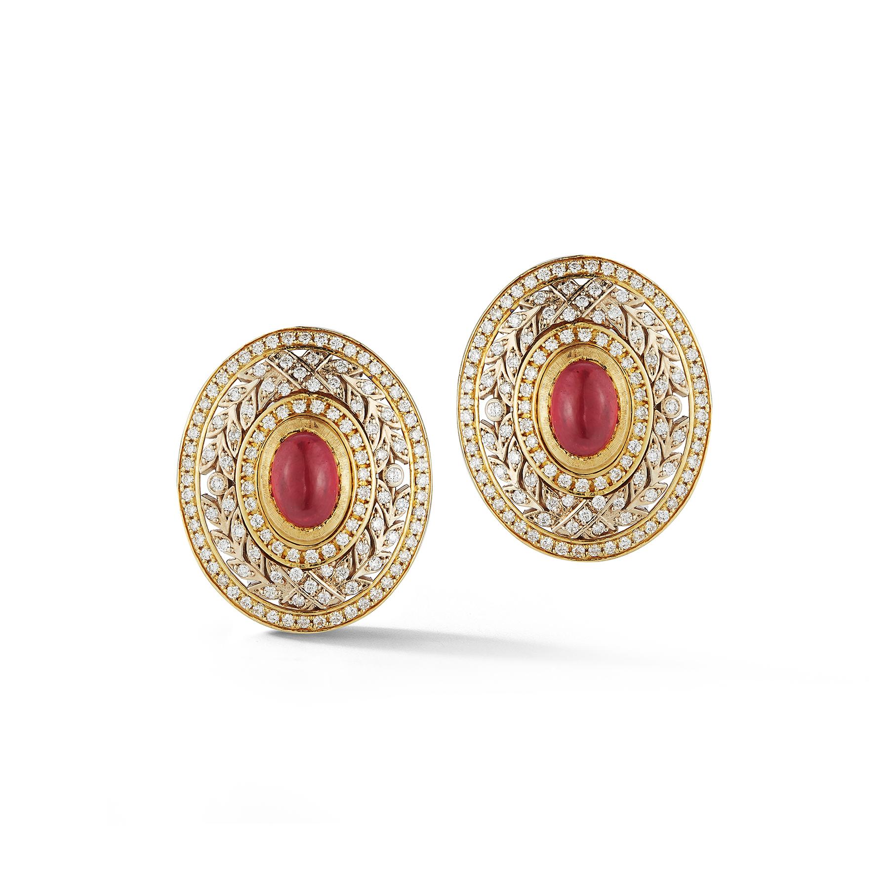 Buccellati Ruby & Diamond Earrings , 2 cabochon rubies approximately 4.00 cts, surrounded by round cut diamonds approximately 3.50 cts set in 18k yellow gold.

Back Type: Clip on

Measurements: 1