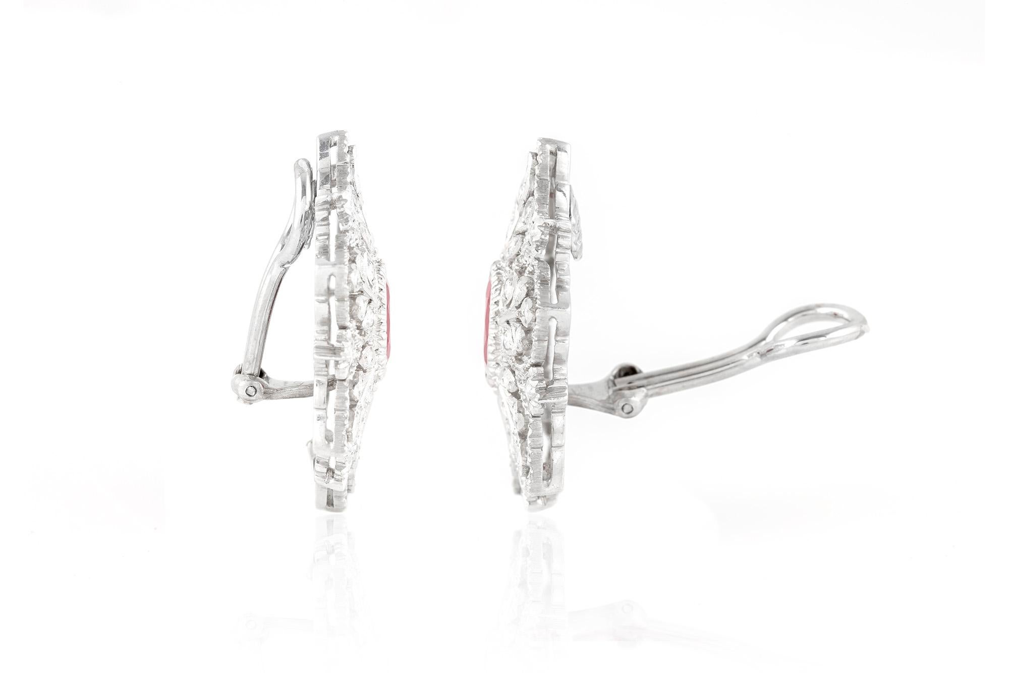 Earrings signed by Buccellati finely crafted in 18k white gold with ruby and diamonds. 