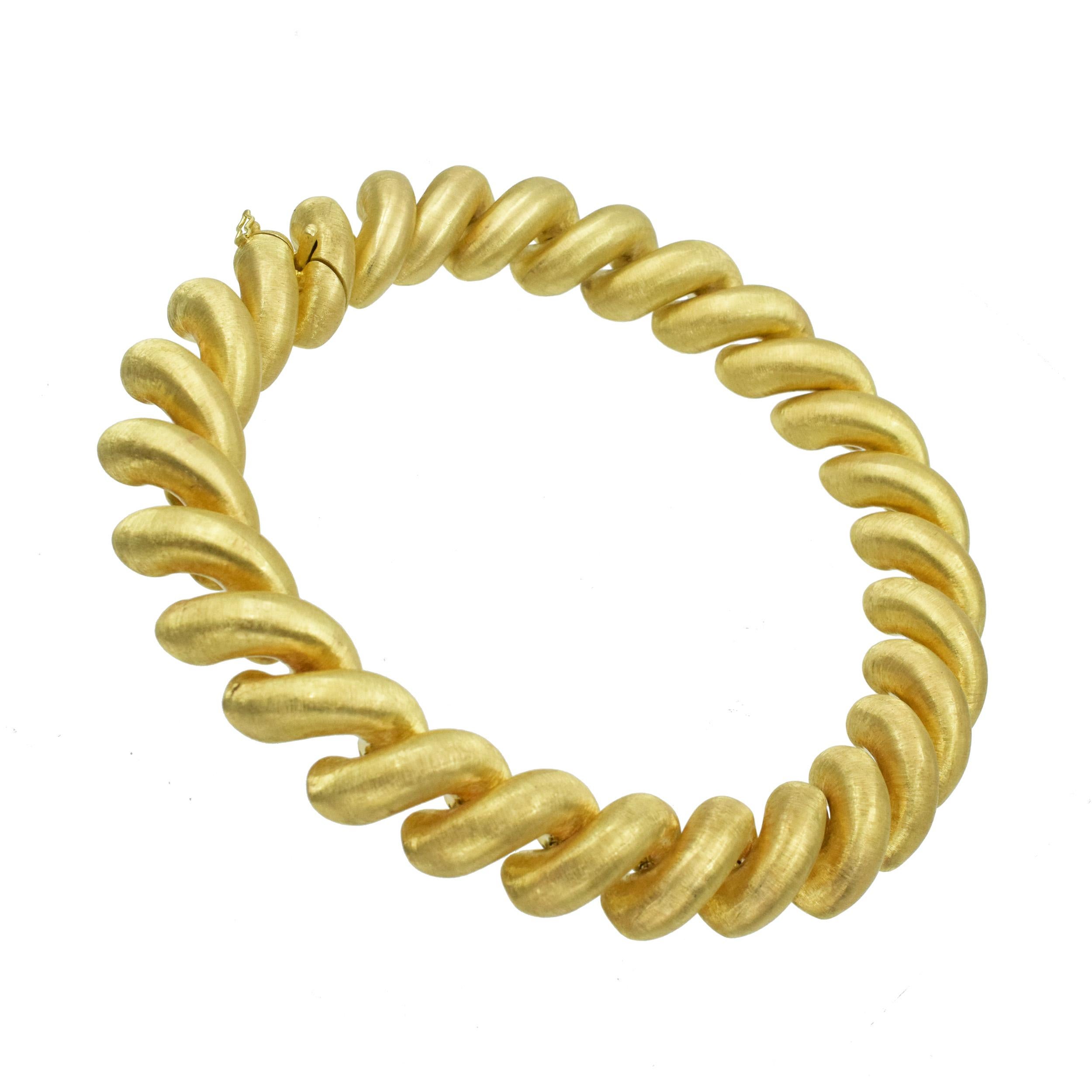 Buccellati 'San Marco' Link Macaroni Necklace in 18k yellow gold. The necklace features
Florentine finish. Equipped with box clasp and fold over security lock.
 Inscribed: Buccellati,
Italy, 18k, AR.
 Width: 20mm.
 Length: 16 inches.
 Weight: 172.4