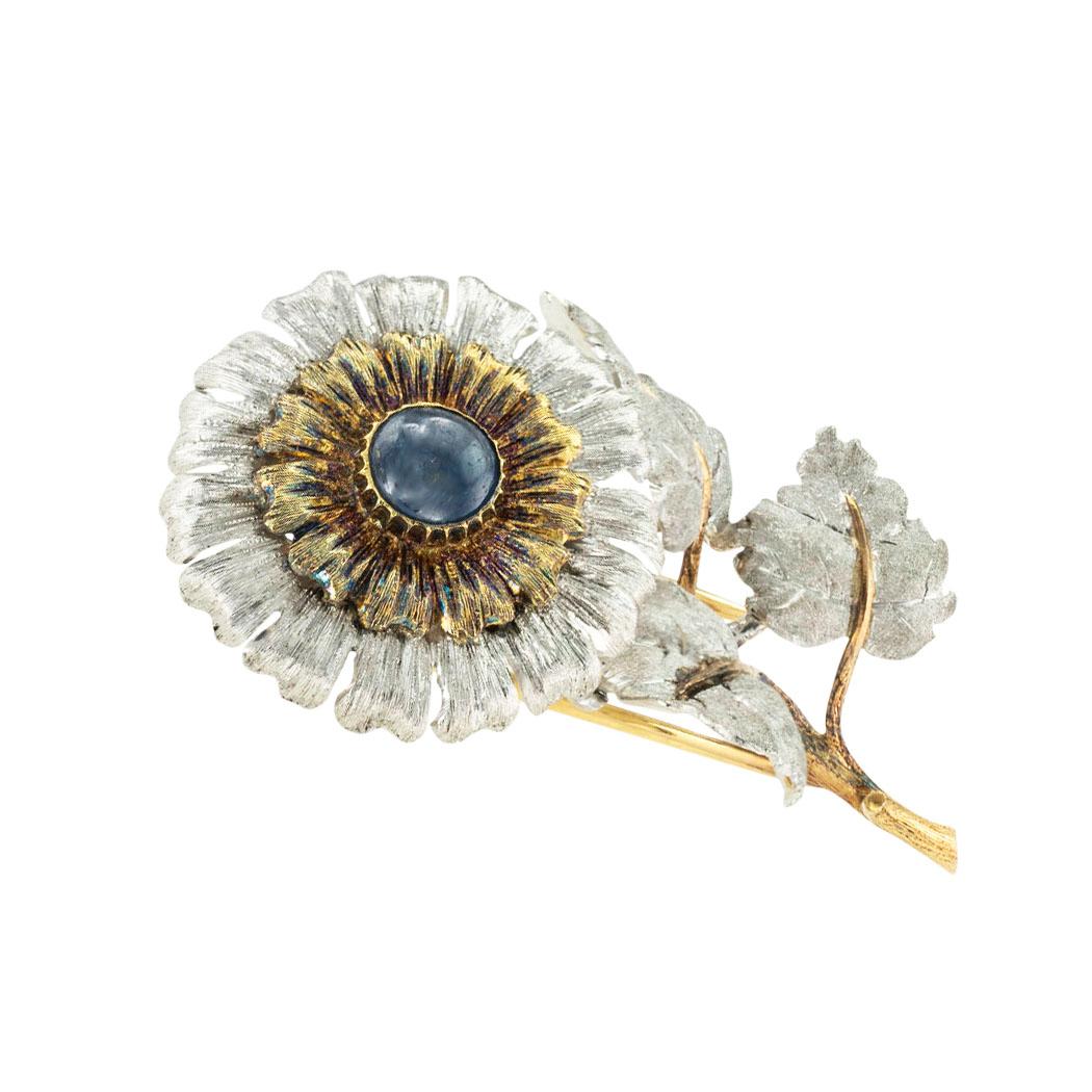 Buccellati sapphire gold and silver sunflower clip-brooch circa 1980. *

ABOUT THIS ITEM:  #P-DJ21J. Scroll down for detailed specifications.  Designed as a stem flower depicting a sunflower variety in full bloom.  The use of mixed metals with a