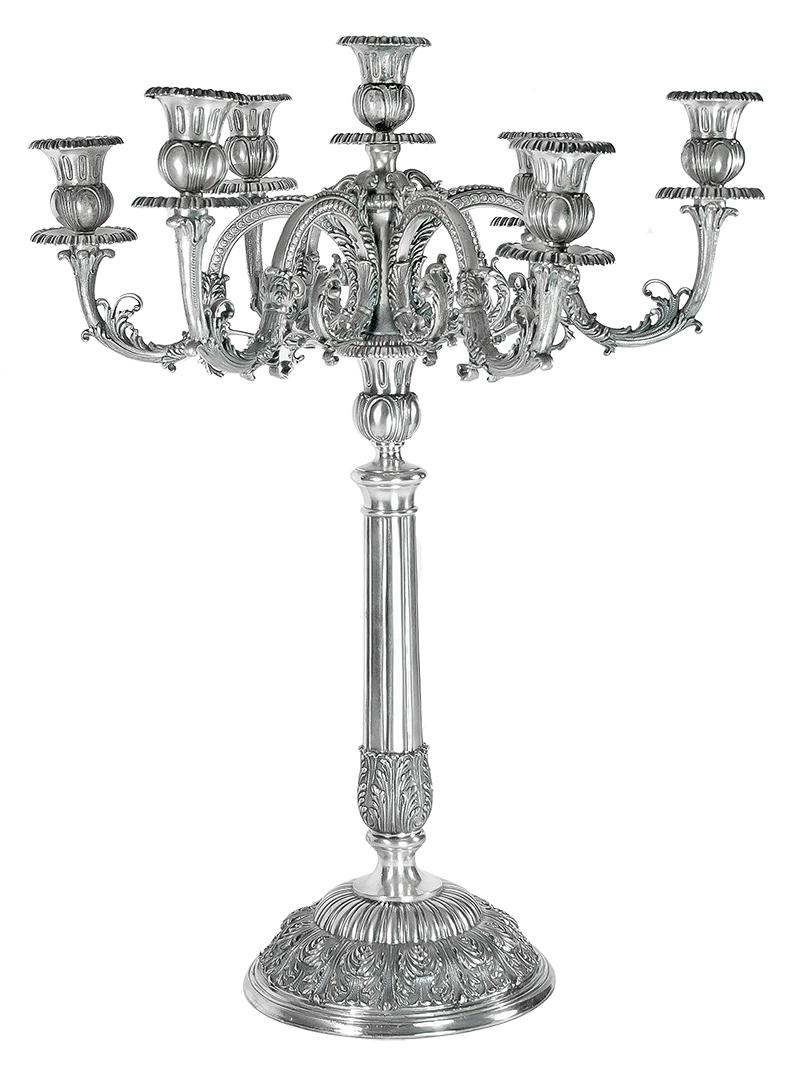 Buccellati silver renaissance candelabra pair in 800 silver.

Buccellati pair of symmetrical matching candlesticks; each measuring approximate: 25? in height, with a top diameter of approximate 19?, a circumference of approximate 55?, and base of