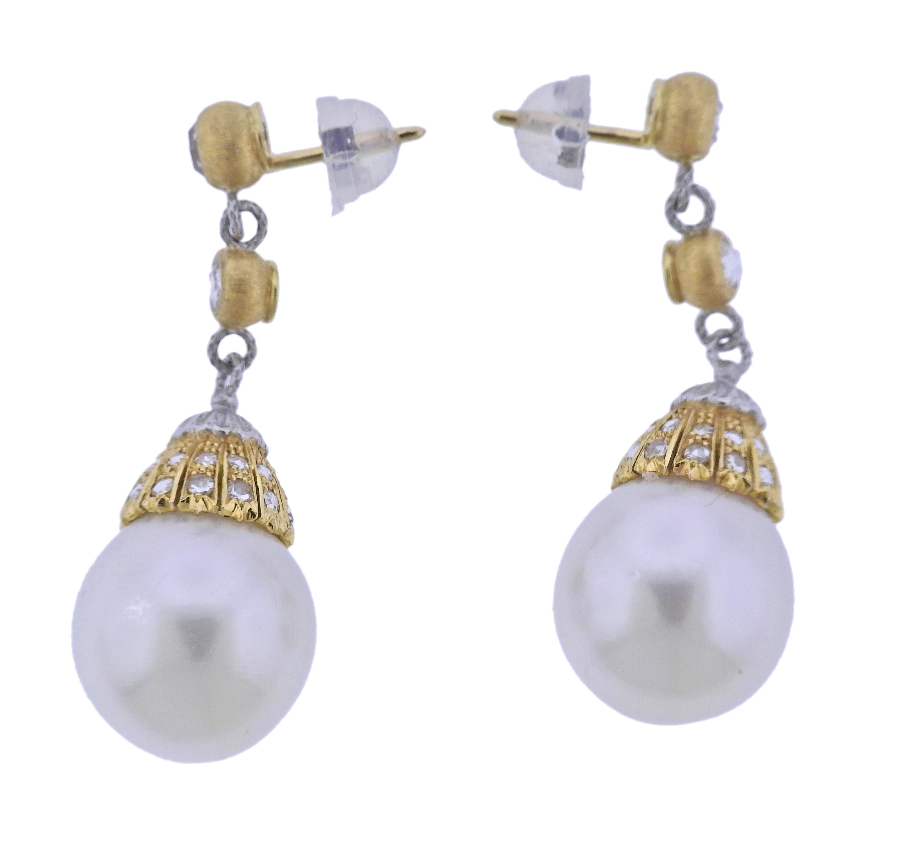 Pair of 18k gold drop earrings by Buccellati, set with 13.8mm South Sea pearls and rose cut diamonds. Earrings are 39mm long. Backs are silver, not original.  Weight - 14.4 grams. Marked Buccellati, 18k, Italy. 