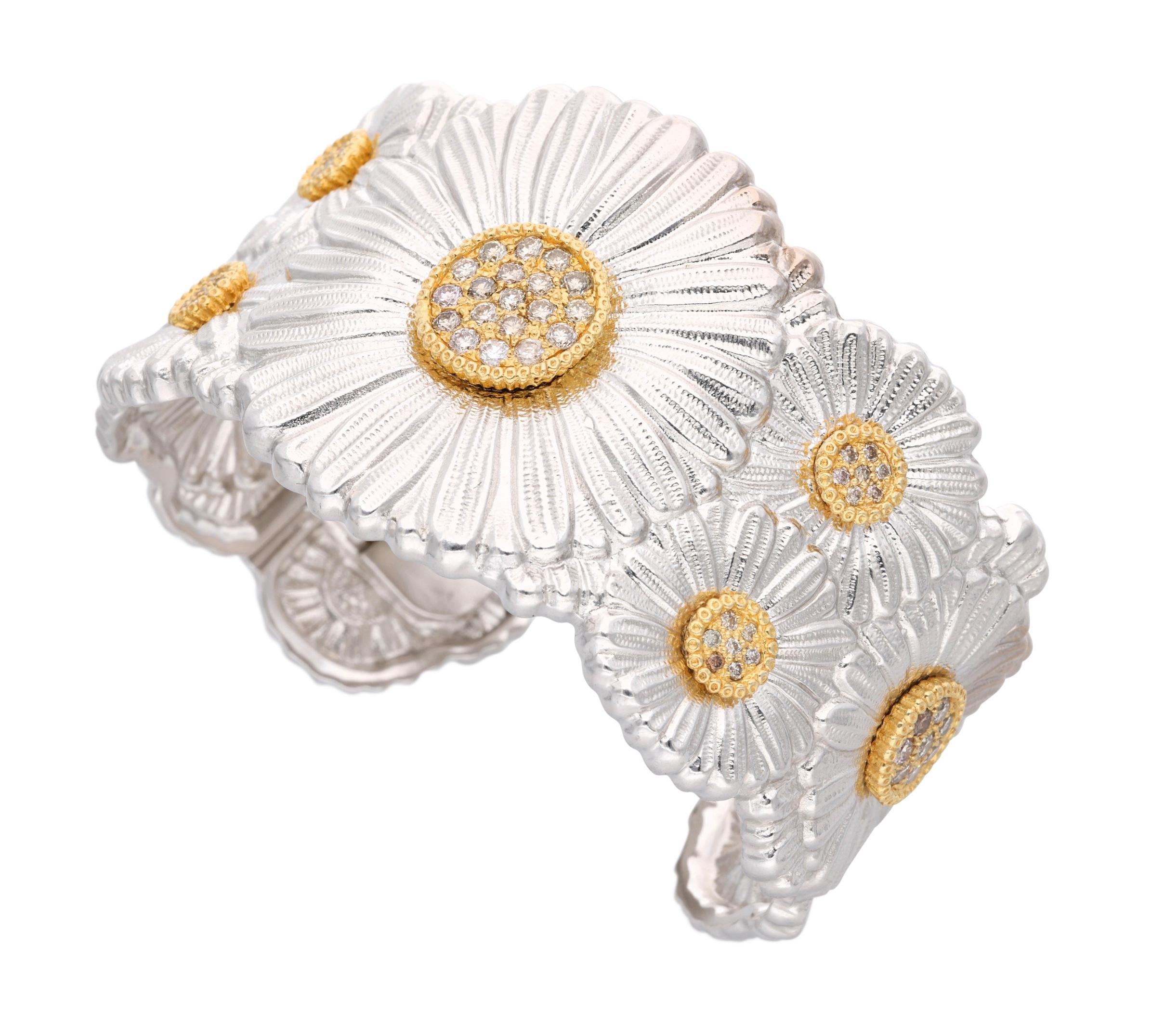 A Buccellati bangle designed with daisy flowers and accented with round diamonds.

- Round diamonds weigh a total of approximately 1.60 carats
- Signed Buccellati with serial number
- Signed Italy
- Sterling silver, vermeil
- Total weight 69.93