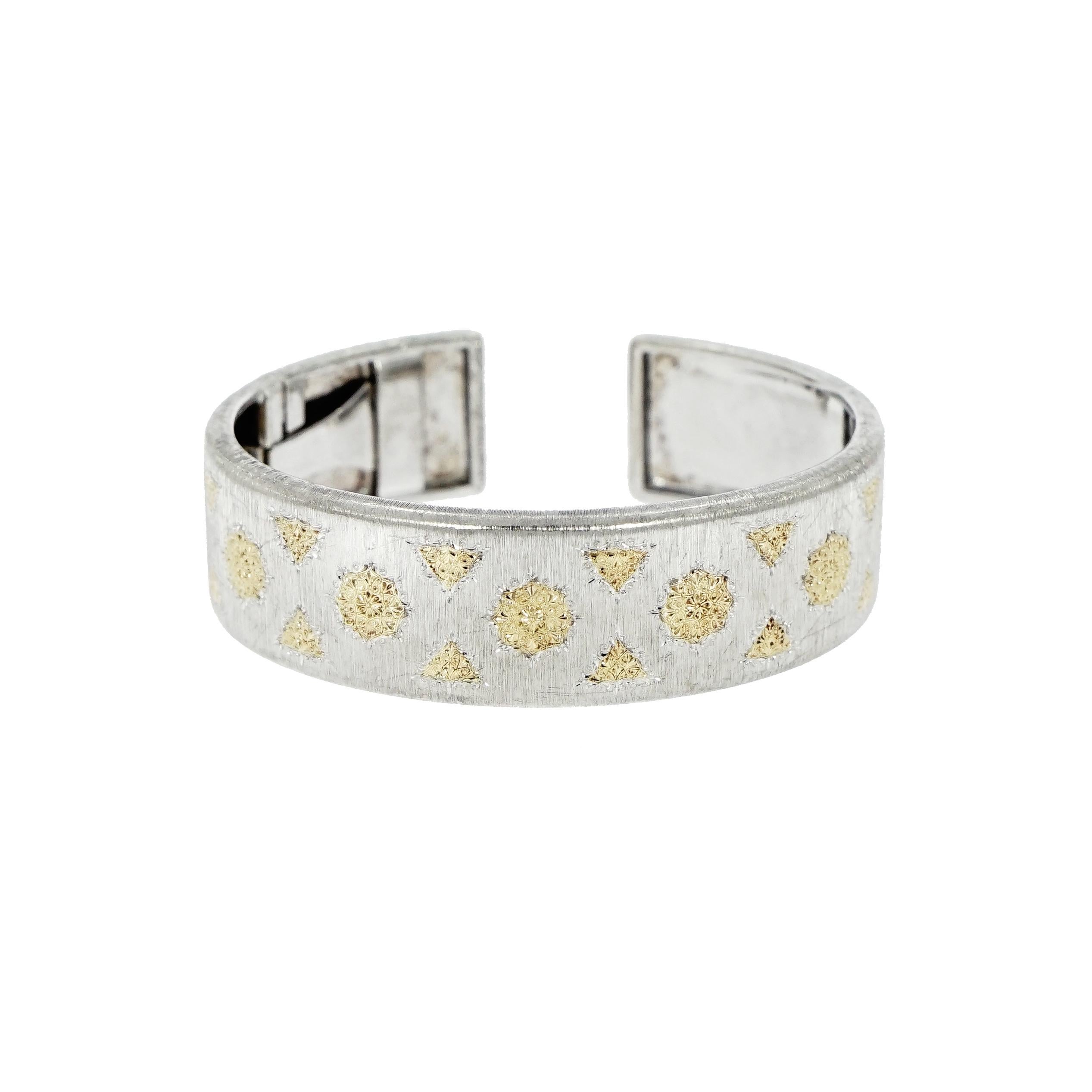 Gianmaria Buccellati Open Cuff Bracelet, handcrafted in Sterling Silver and decorated with 18K yellow gold accents.
The cuff Measures: 58mm x 48mm
Width: 18mm 
Weight: 38.10 grams
Marked:  Gianmaria Buccellati, Italy, 925 
