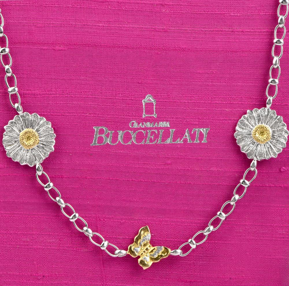 Women's metalic stering silver with daisy and butterfly chain. Hand crafted in Italy by Bucceltali. It is Perfect for double-wrapping around the ceck, this nature-inspired design boasts pretty flower stations on a sterling silver link chain.   