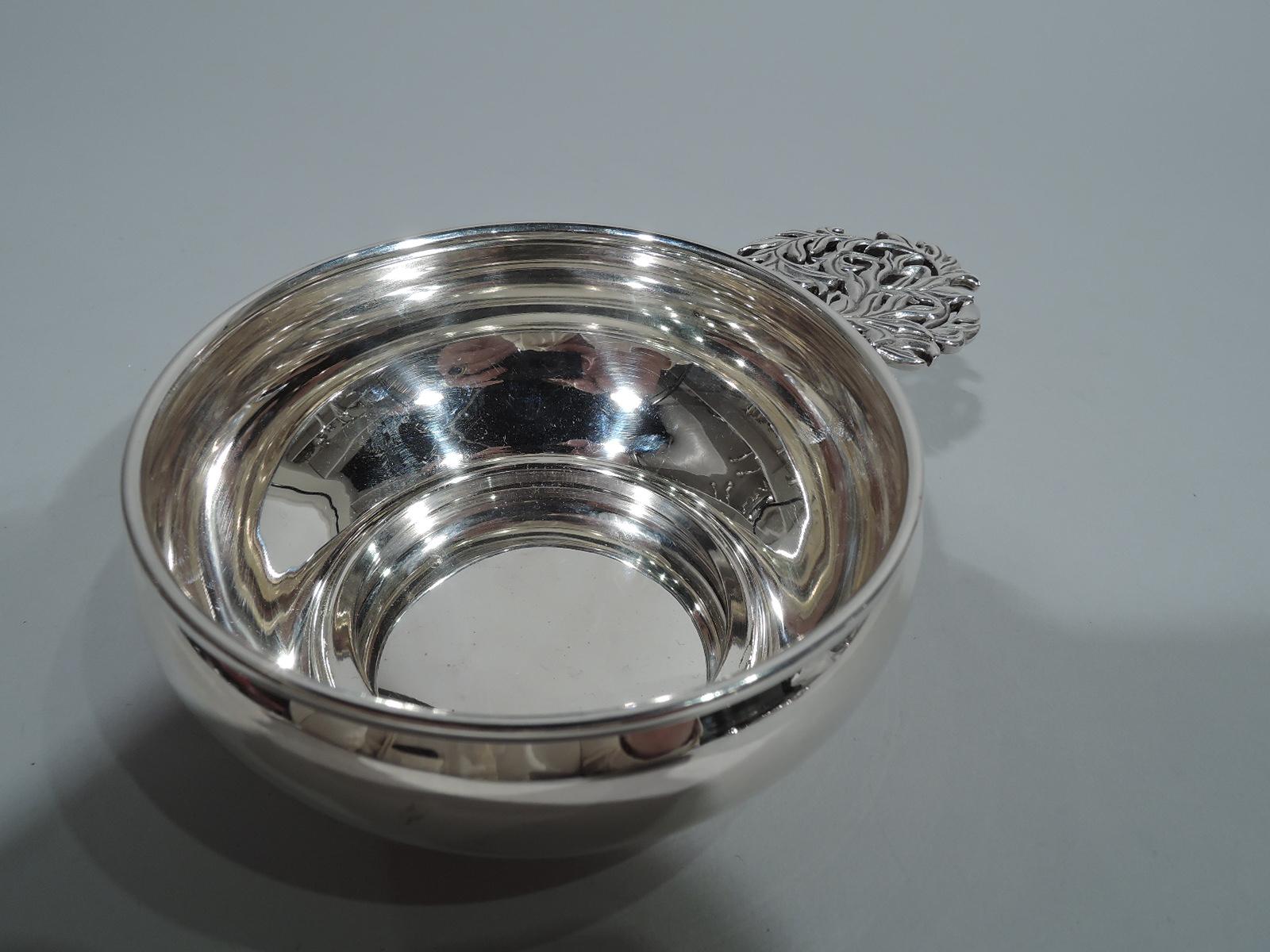 Sterling silver porringer. Made by Buccellati in Italy. Plain and curved sides. Pierced handle with tooled leaves. A stylish baby with plenty of room for engraving. Fully marked including maker’s and retailer’s (Isabella Stewart Gardner Museum)