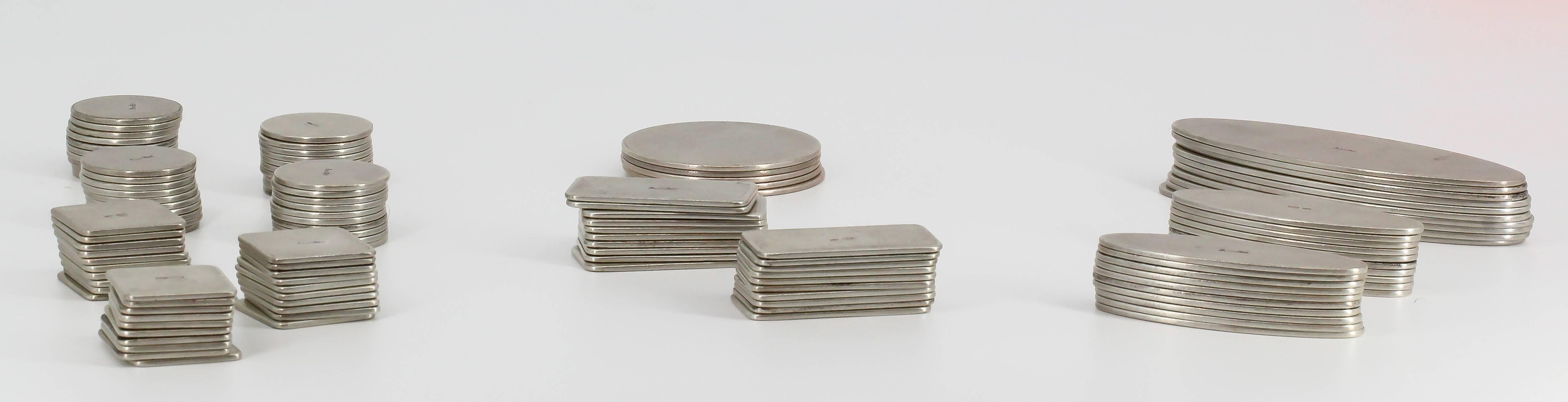 Rare and unusual sterling silver chip set by Buccellati. It features various sizes and shapes of chips for roulette playing or a variety of other games such as poker, etc... 125 total chips.  An interesting gift for an interesting man.

Hallmarks: