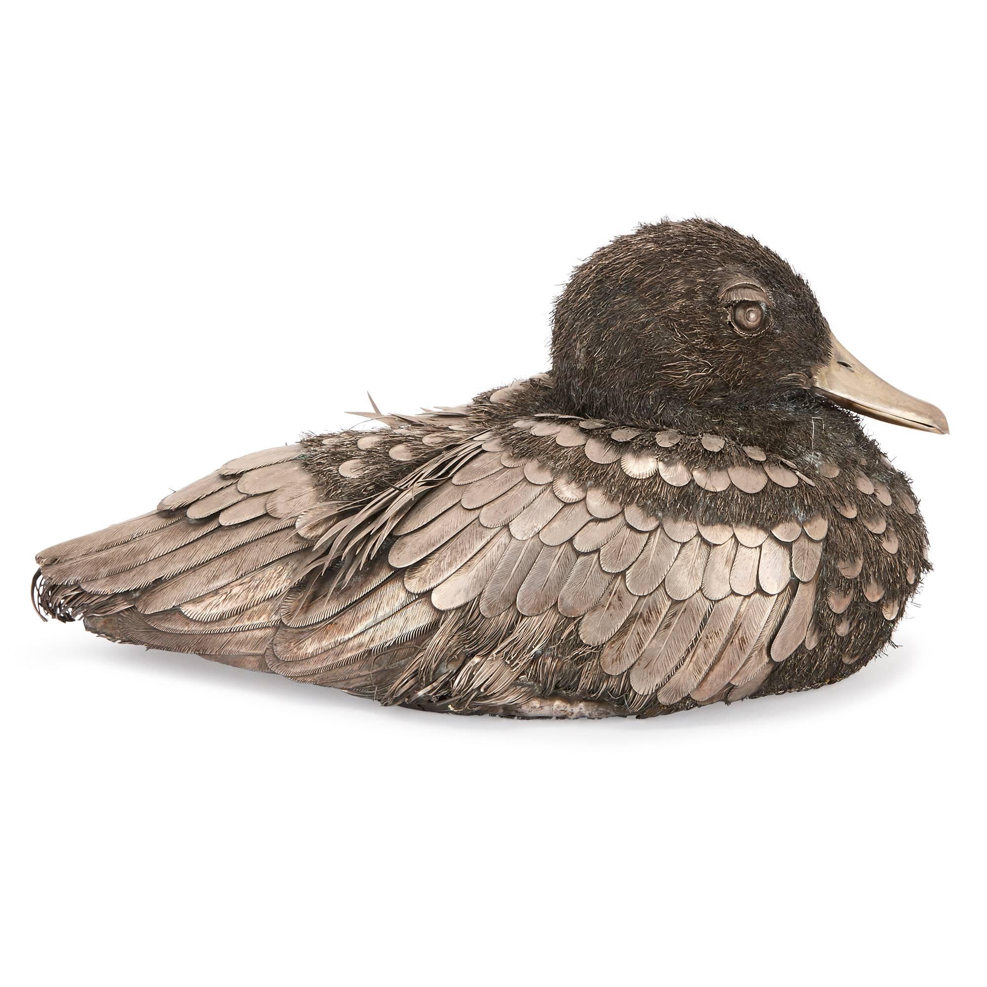 This charming silver sculptural model of a duck has been carefully crafted in the style of the celebrated jeweler Mario Buccellati (Italian, 1891-1965) and is a startlingly realistic representation.

The duck is made entirely in silver and is