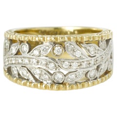 Anello a fascia in oro 18k con diamanti bicolore stile Buccellati