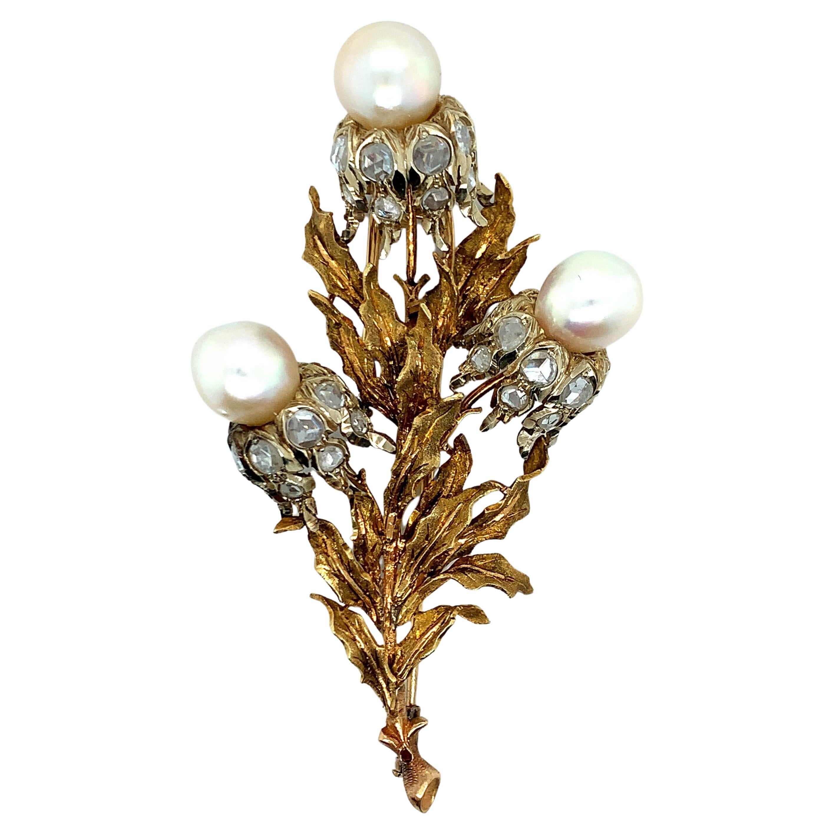 Goldbrosche mit drei Perlen und Diamanten von Buccellati