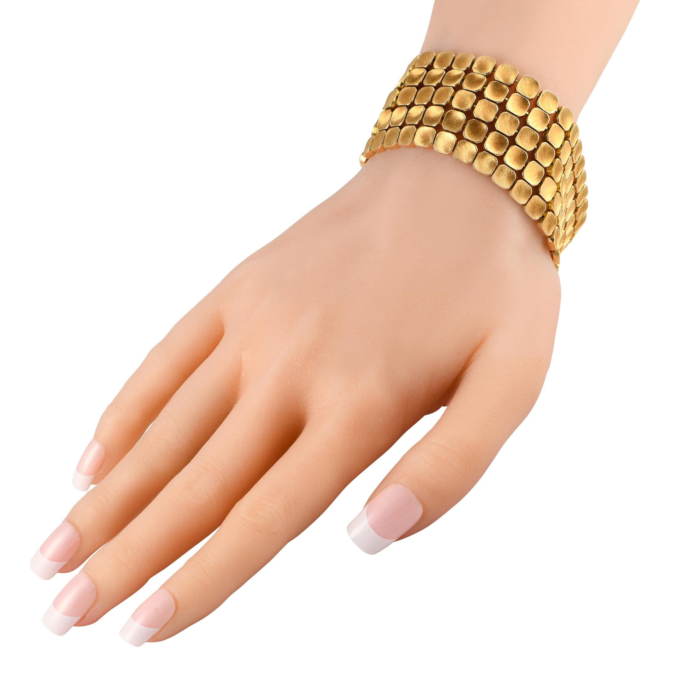 Switch things up and instantly add visual interest to your outfit with this gorgeous piece of textured jewelry. This 18K yellow gold bracelet is a lovely creation of famed Italian goldsmith Mario Buccellati. It features tiny octagonal tiles in