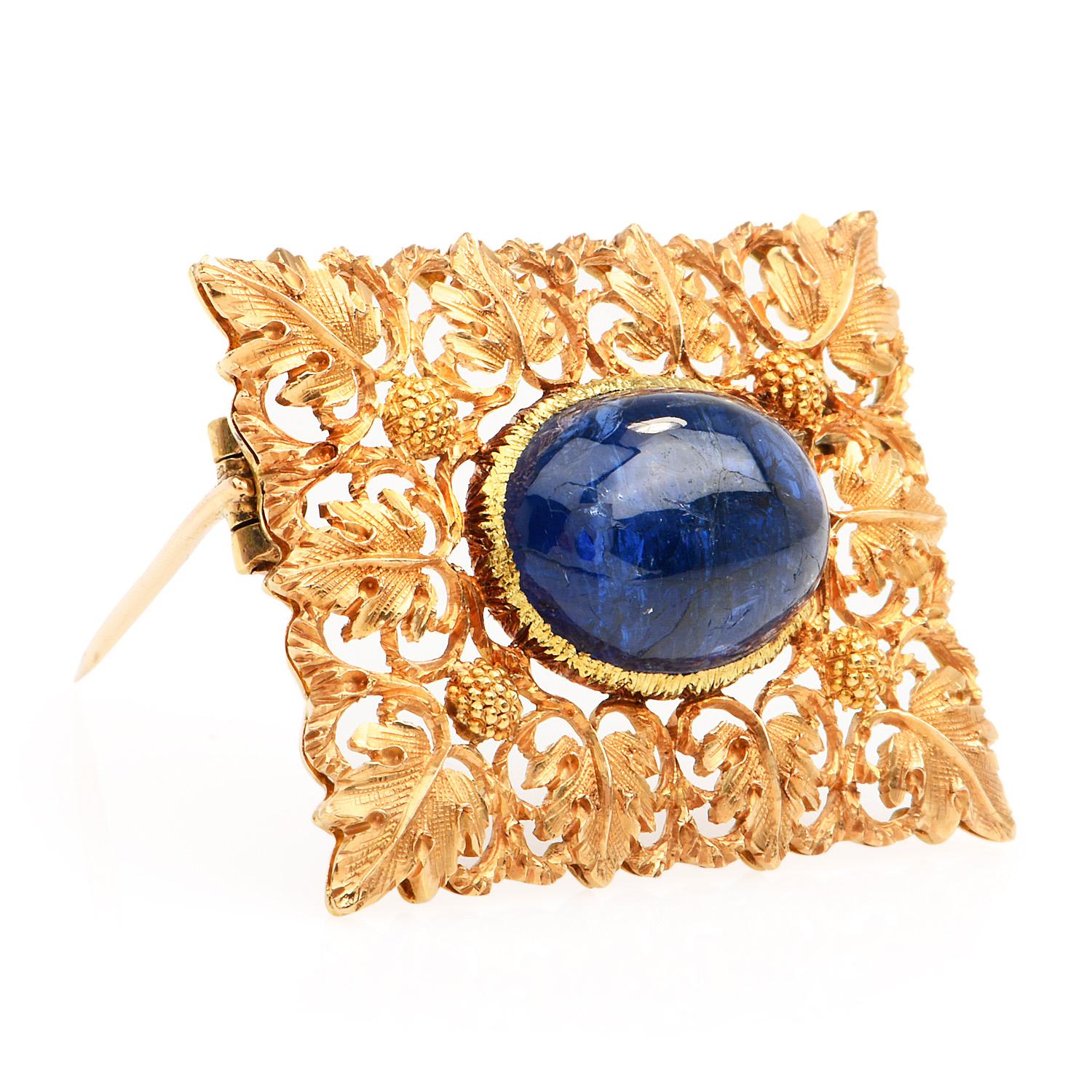 This Extraordinary rectangular Vintage  Buccellati Diamond and Sapphire Brooch.

This piece was crafted in  Luxurious 18K yellow gold.

Measuring approx. 33 mm x 25 mm,  this brooch

features 1 Natural No Heat cabochon  Blue Sapphire in the center