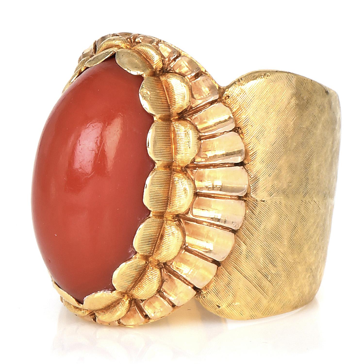 Vintage Retro Floral inspired Buccelatti, Piece.

A highly detailed handcrafted piece, from the 60s-70s by the designer Mario Buccellati. 

Centered by a vibrant red genuine Coral, Cabochon oval cut, Bezel set, Measuring approximately, 18 mm x 9 mm