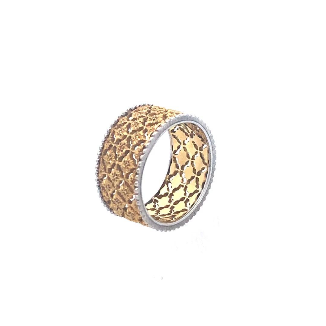 An Exceptional estate piece by Buccellati: an 18k Yellow Gold & Platinum Band. Measuring 9.5mm wide and sized at 6, this luxurious ring exemplifies the renowned craftsmanship and intricate detailing Buccellati is celebrated for. The harmonious blend