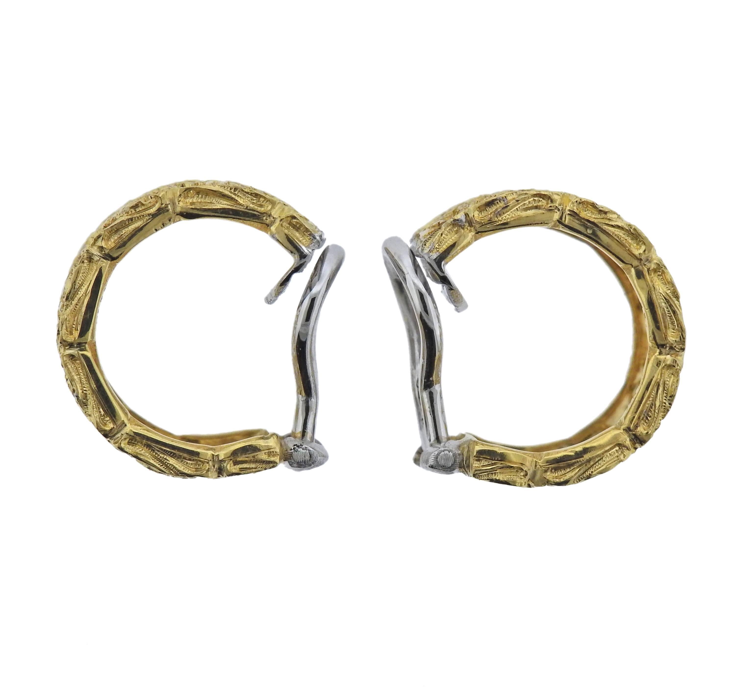 18k yellow gold hoop earrings, featuring rose flower openwork motif. Designed by Buccellati, retail $11400. Earrings 17mm x 10mm , weigh 10.7 grams. Marked: Gianmaria Buccellati, X5456.