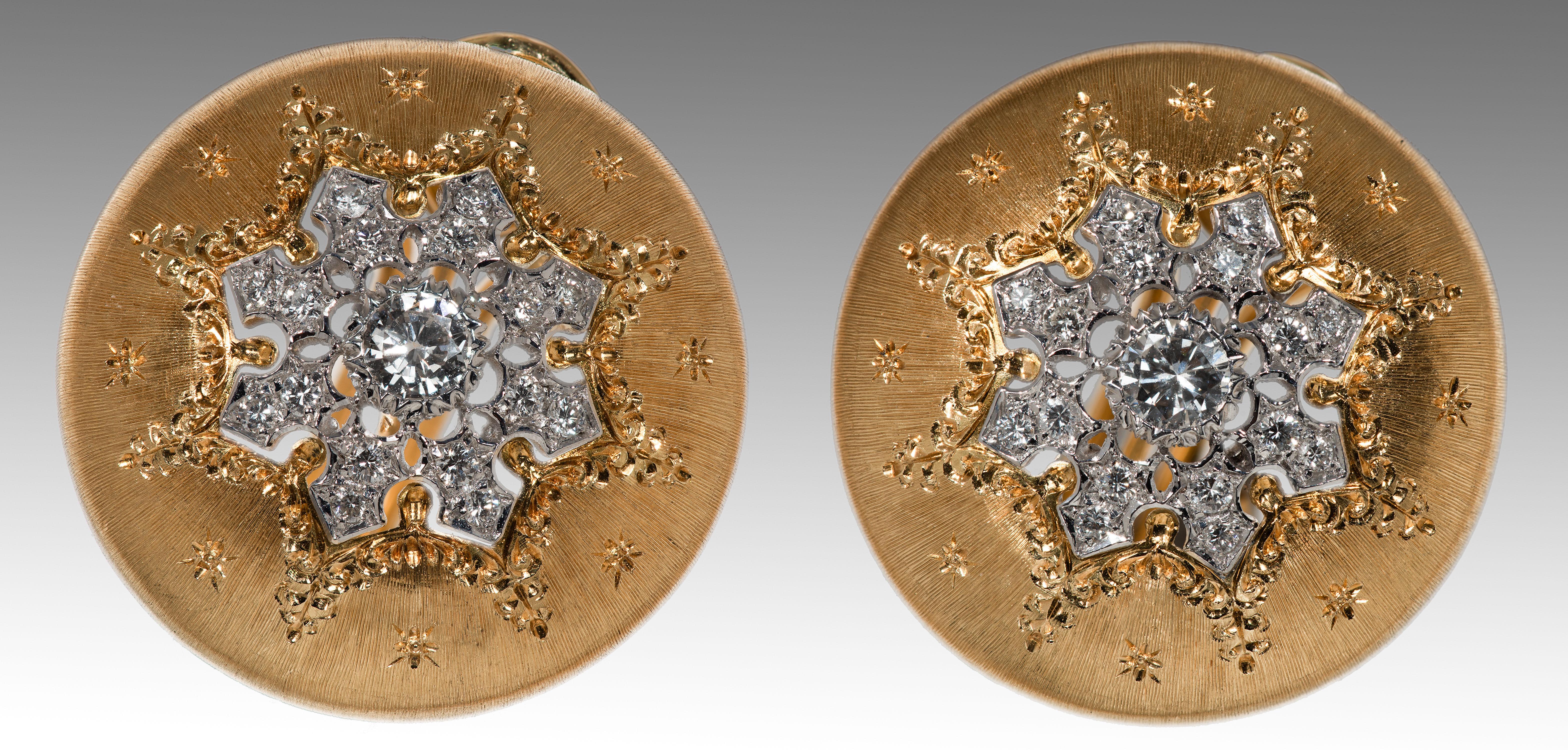 These generously proportioned earrings are a classic design from this revered Italian master jeweler. Enhanced by their signature texture-engraving, the 18k yellow gold discs are centered with brilliant-cut diamonds in a starburst pattern.