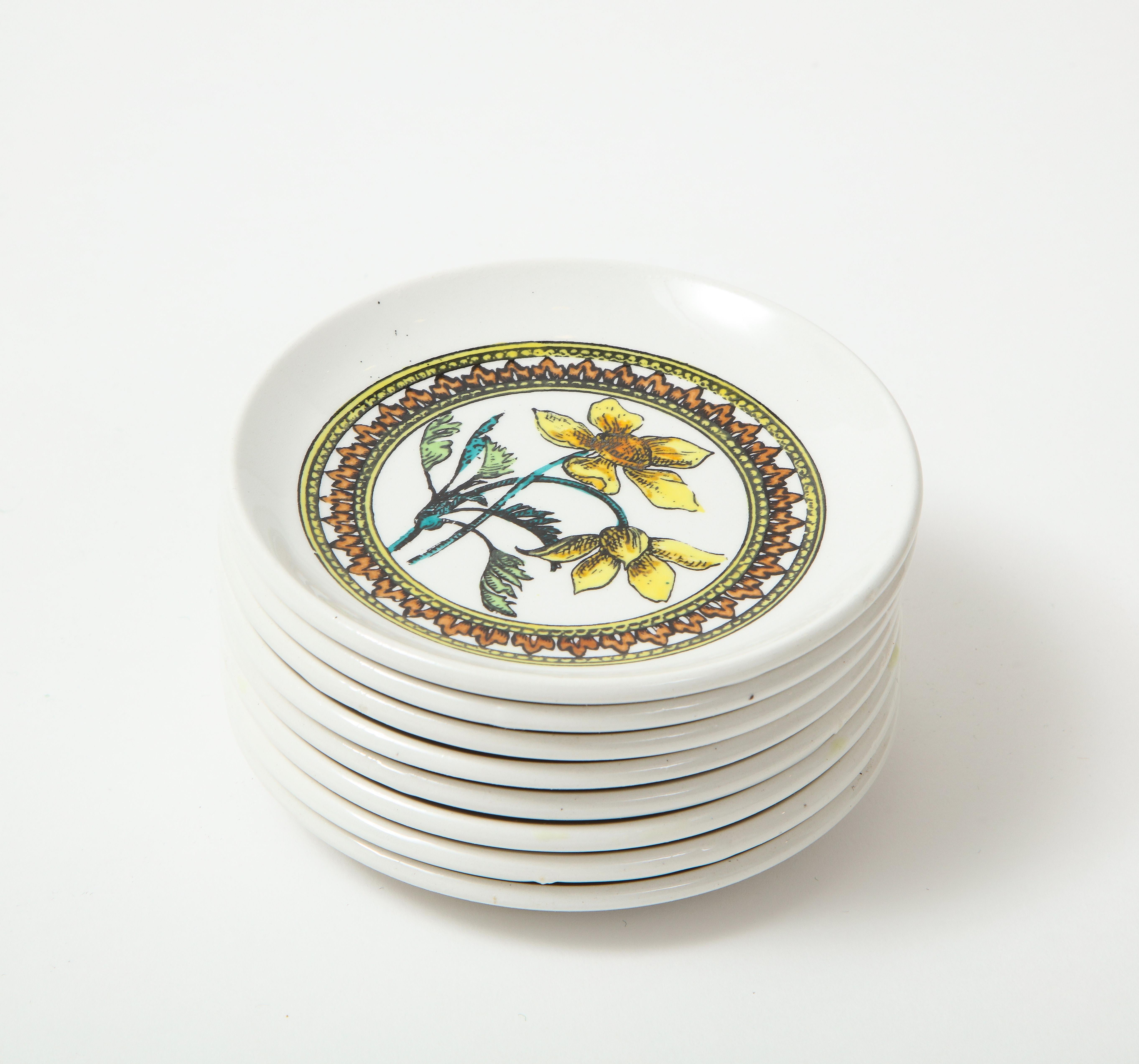 Set of Italian 8 botanical themed porcelain snack plates, coasters each depicting a different flower. 
Signed on back.