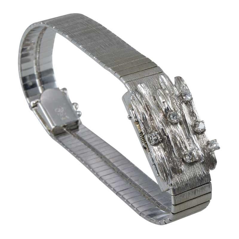 FACTORY / HOUSE: Bucherer Switzerland
STYLE / REFERENCE: Ladies Dress Model
METAL / MATERIAL: 14kt Solid White Gold
CIRCA / YEAR: 1950's
DIMENSIONS / SIZE: 23mm x 15mm
MOVEMENT / CALIBER: Manual Winding / 17 Jewels 
DIAL / HANDS: Original Silvered