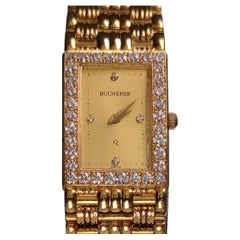 Bucherer 18k Gold and Diamonds Lady Watch
