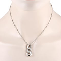 Bucherer Halskette mit geschwungenem Gliederanhänger, 18 Karat Weißgold 0,35 Karat Diamant