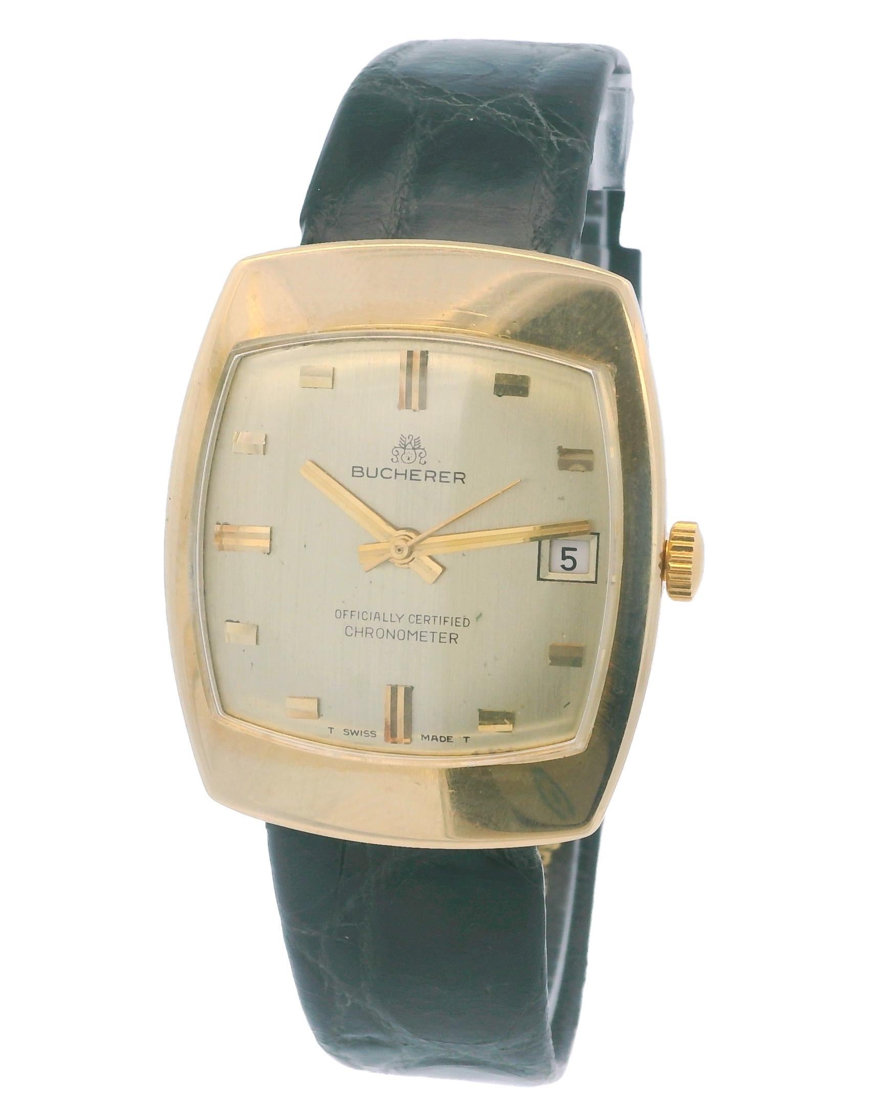 18k Gold cushion-shaped automatic watch by Bucherer. Features a champagne dial with a date indicator. Snap case back. Aftermarket Black leather band. Swiss-made.

Face size 31mm

Length up to 7.75”
