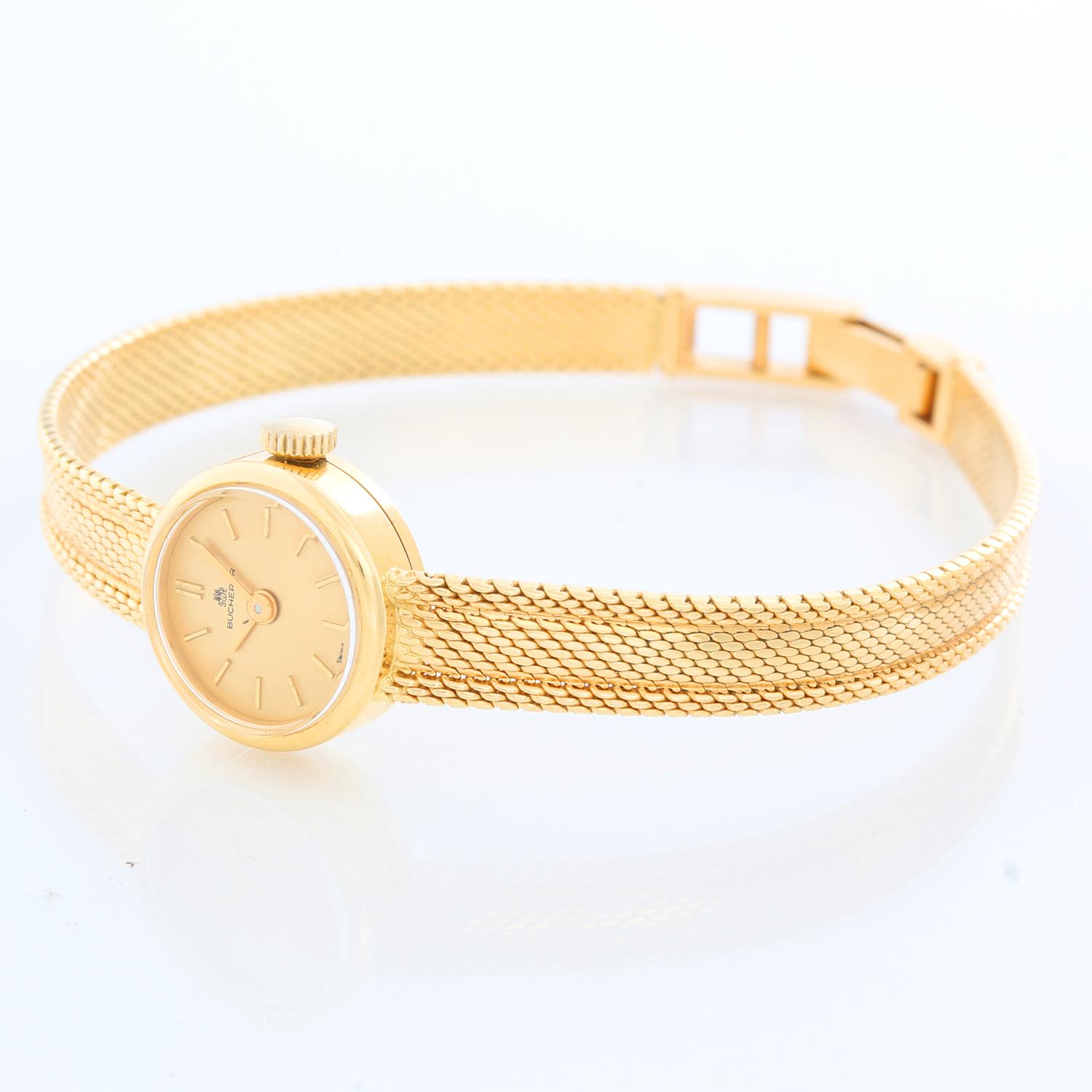 Bucherer 18K Yellow Ladies Gold Watch - Manual. 18k Yellow Gold ( 15 mm ). Champagne dial with stick hour markers. Mesh 18K yellow gold bracelet. Will fit up to a 6.25 inch wrist. Pre-owned with Bucherer box. 